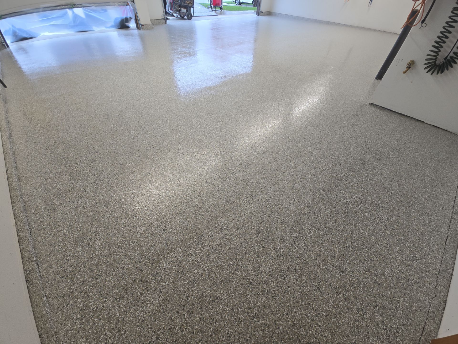 Hayden Garage Floor Transformation with Mt. Everest Flake Finish by Croc Coatings, LLC