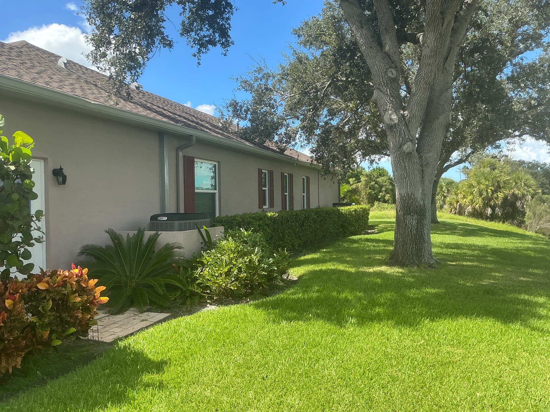 White 6-Inch Seamless Gutters in Sarasota FL by Gutter Professor by Gutter Professors