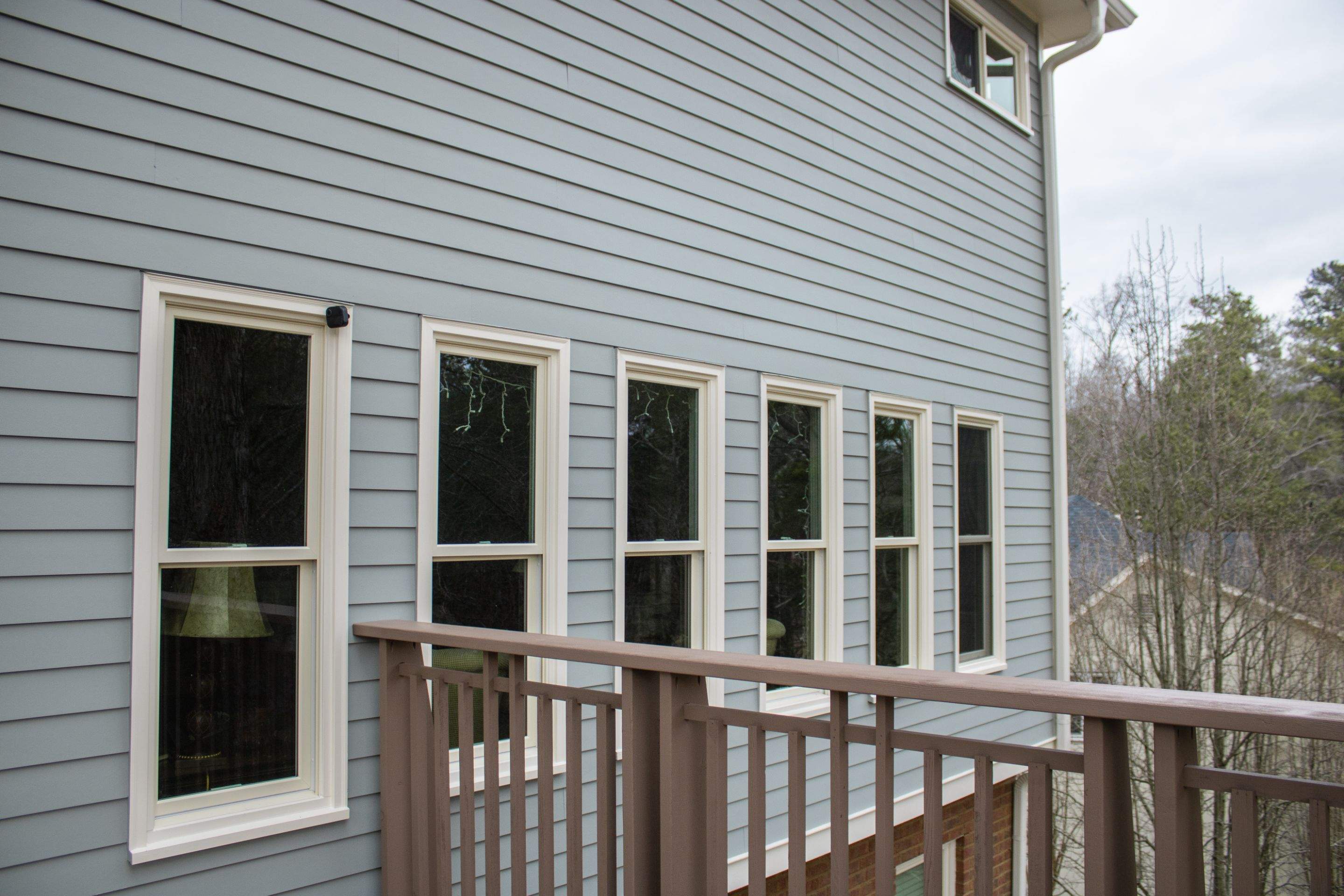 James Hardie Siding Replacement, Exterior Painting, Deck Stain, and Gutter Installation in Peachtree Corners, GA by Nelson Exteriors