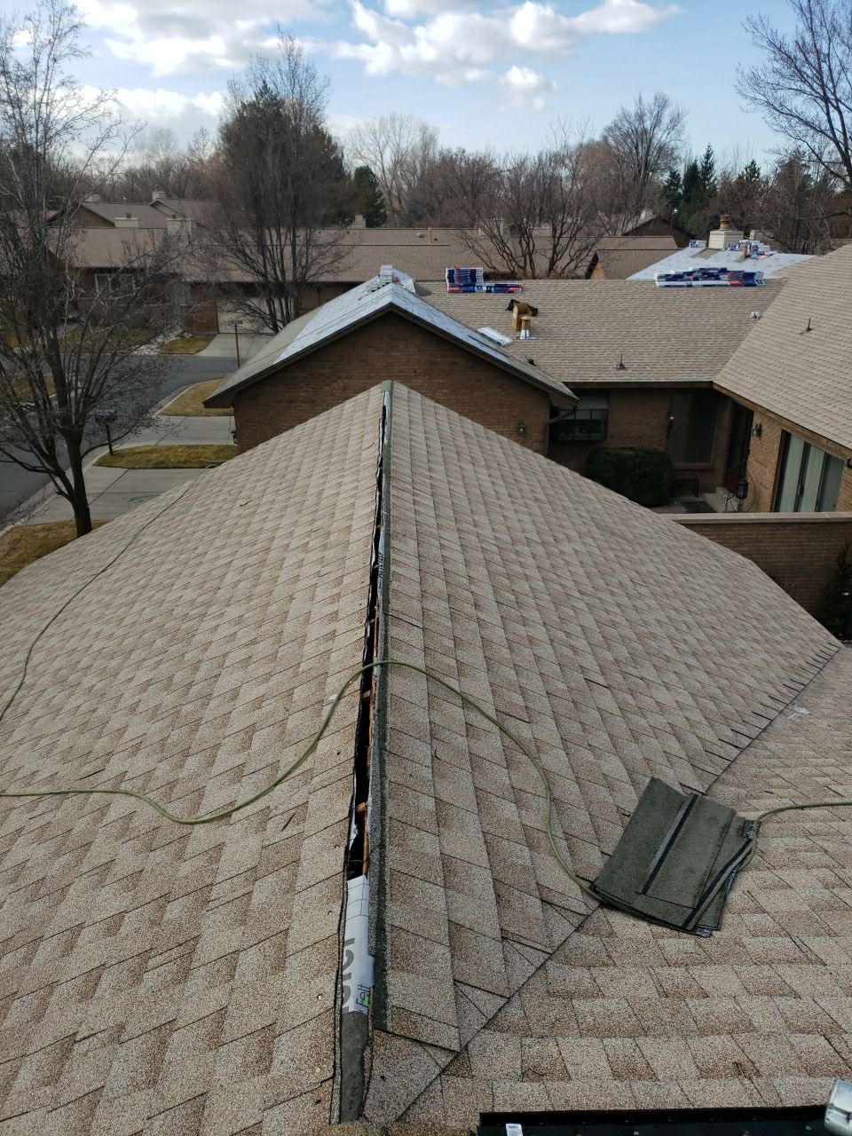 Storm Damaged Roof using GAF Timberline HDZ - Lifetime Shingle by The Roof Doctor