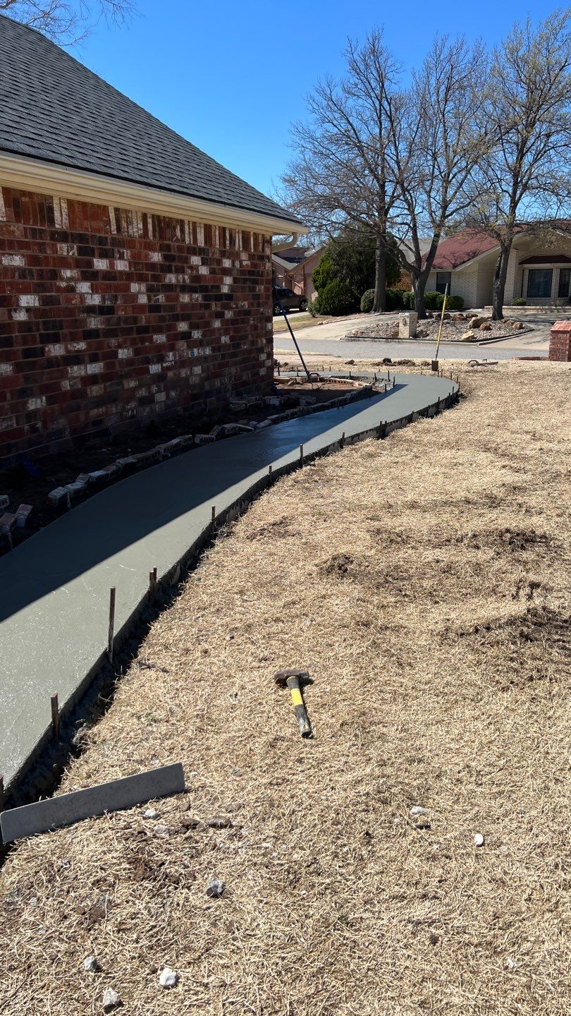 Concrete sidewalk using Concrete by Clays Services Inc