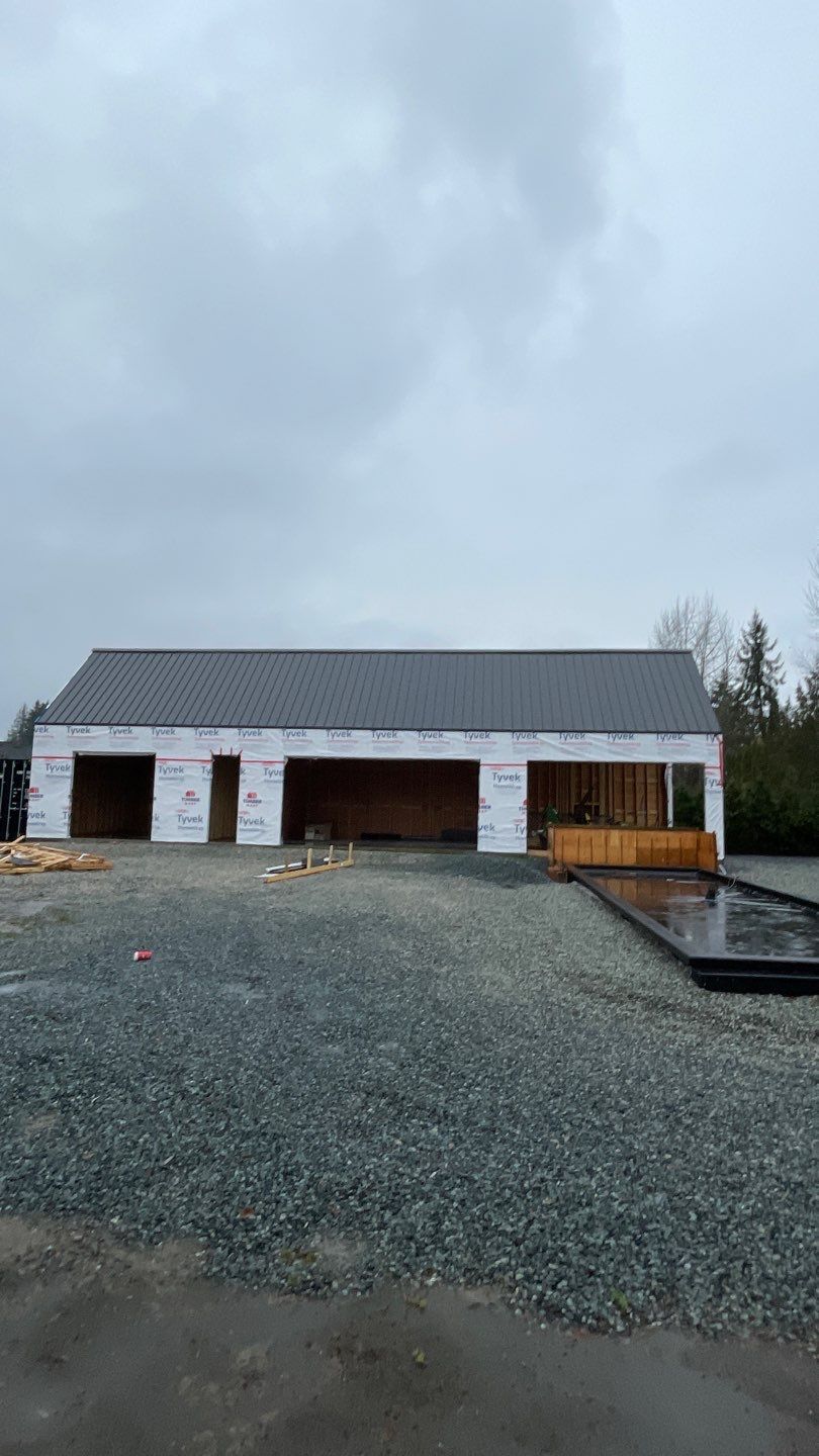 Residential Roofing and siding Installation using 12" Prolok metal  by Top Notch Roofing Inc