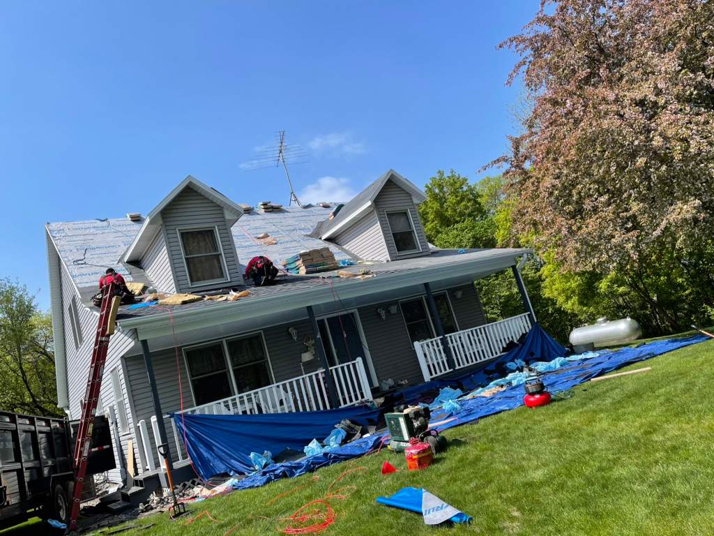 Residential Roofing Installation using Certainteed Landmark Moire Black by MODERN EXTERIOR SYSTEMS