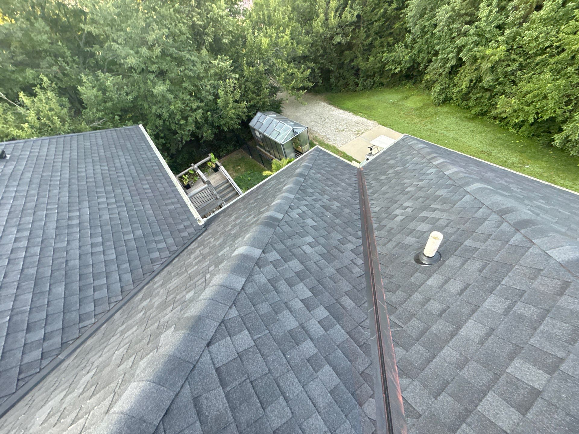 Rustic Black roof by Victor Construction