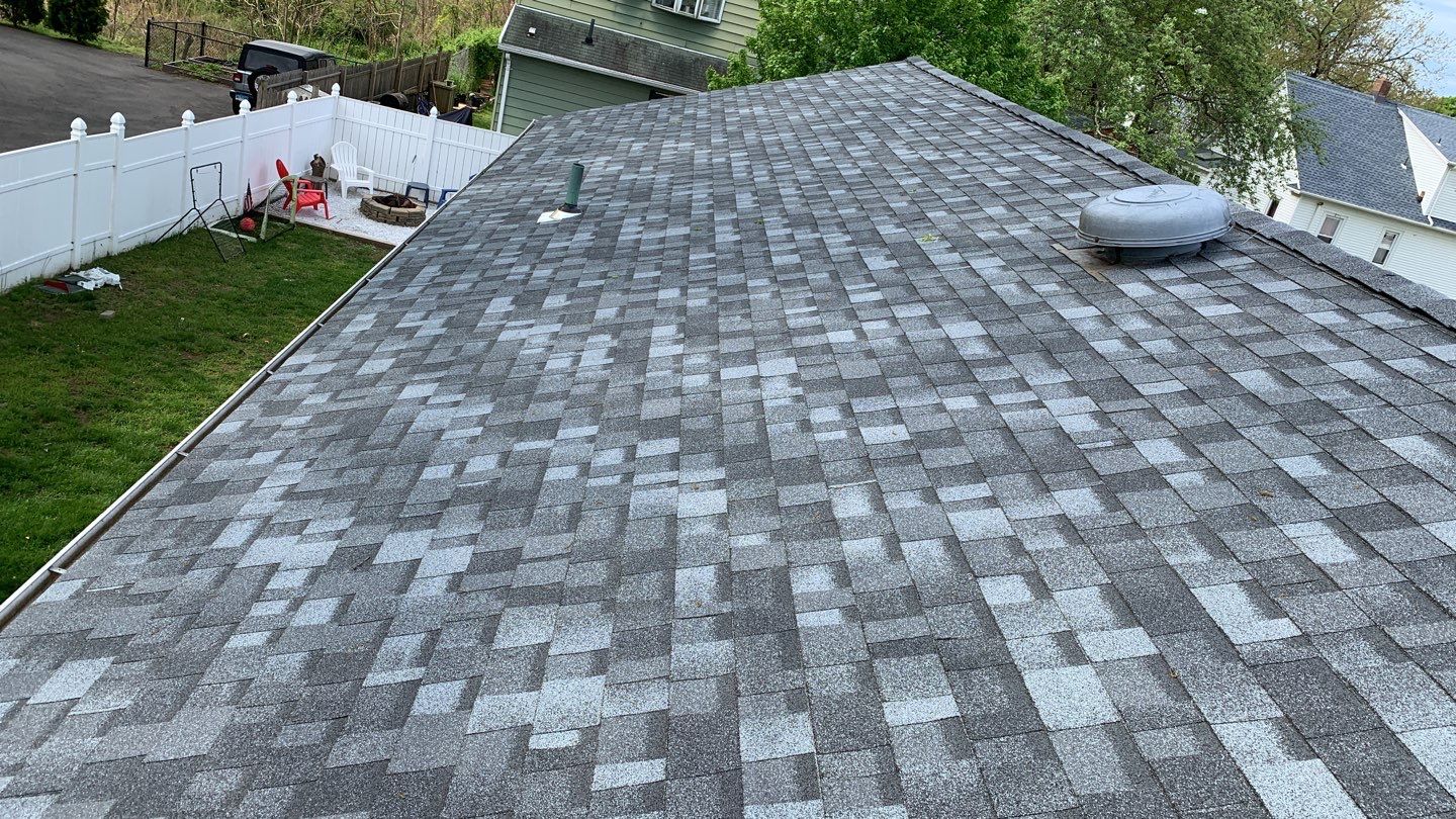 Residential Roofing Installation using Owens Corning Duration Slatestone Gray by A Plus Exterior