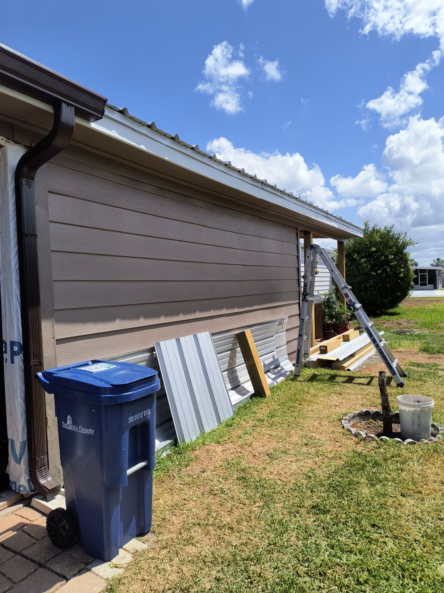 6 Inch Seamless Gutters using 3X4 Elbow Downspout in Venice FL by Gutter Professors