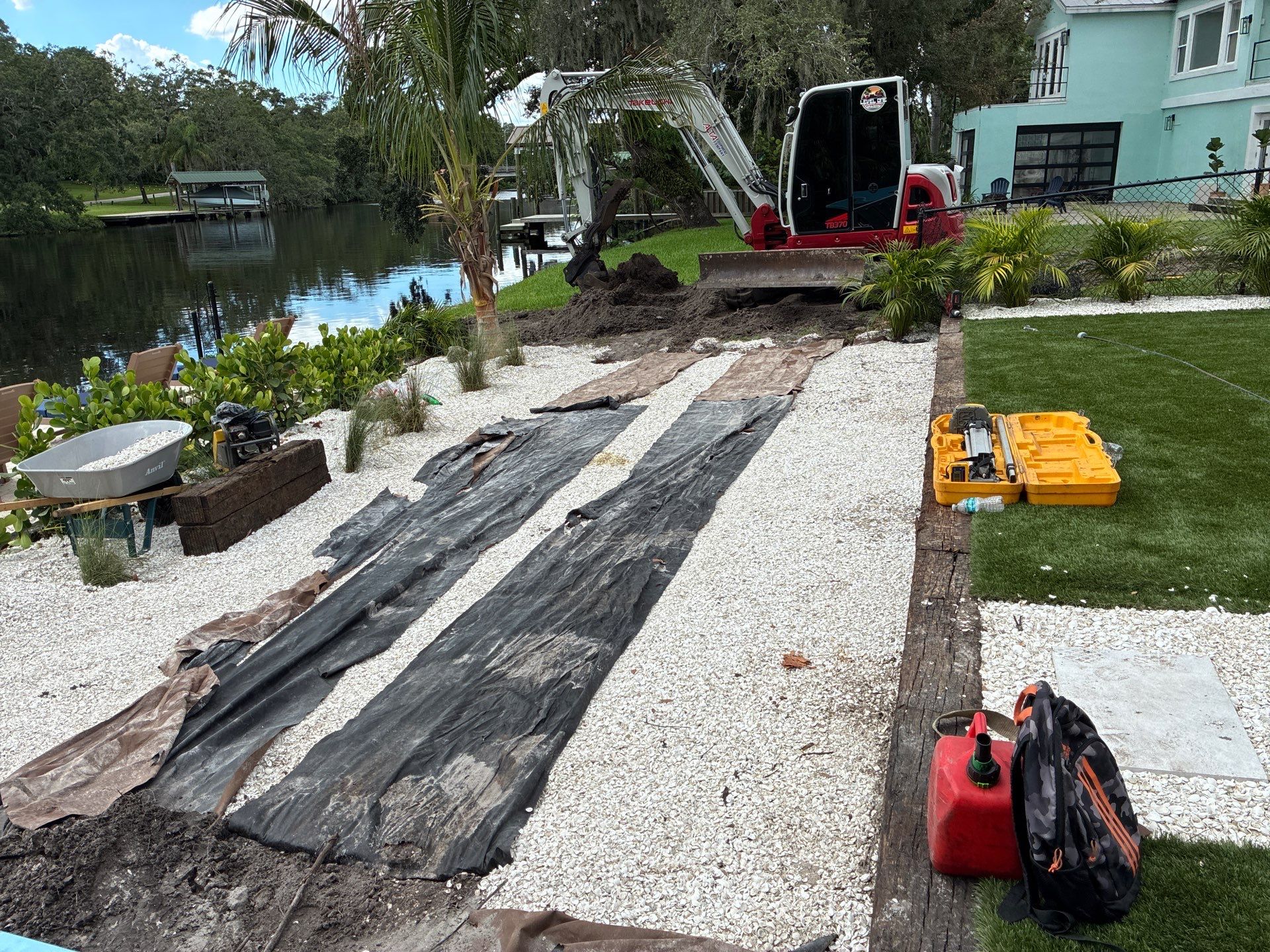 Grading back yard oasis by Level One Grading