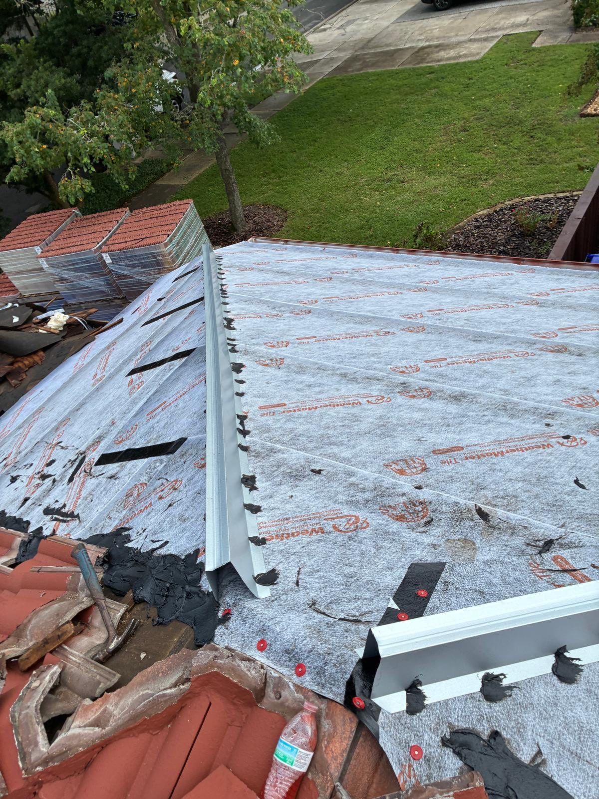 Residential Tile Roof Replacement and Gutter Installation in Winter Park by Pinnacle Roofing Group