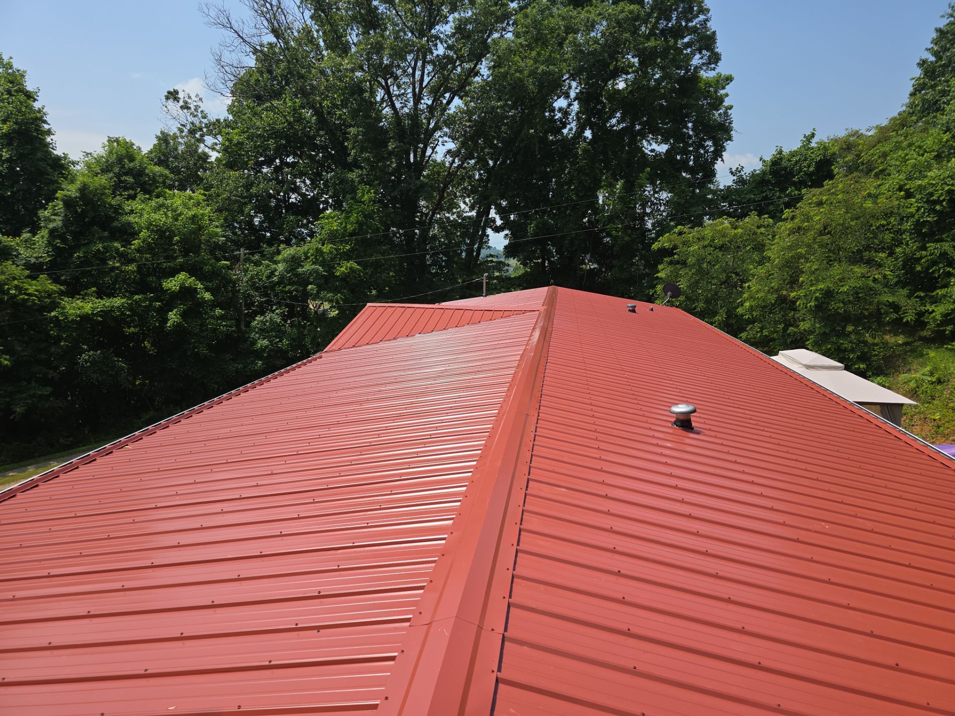 Barn Red Metal Roof by Omnia Roofing