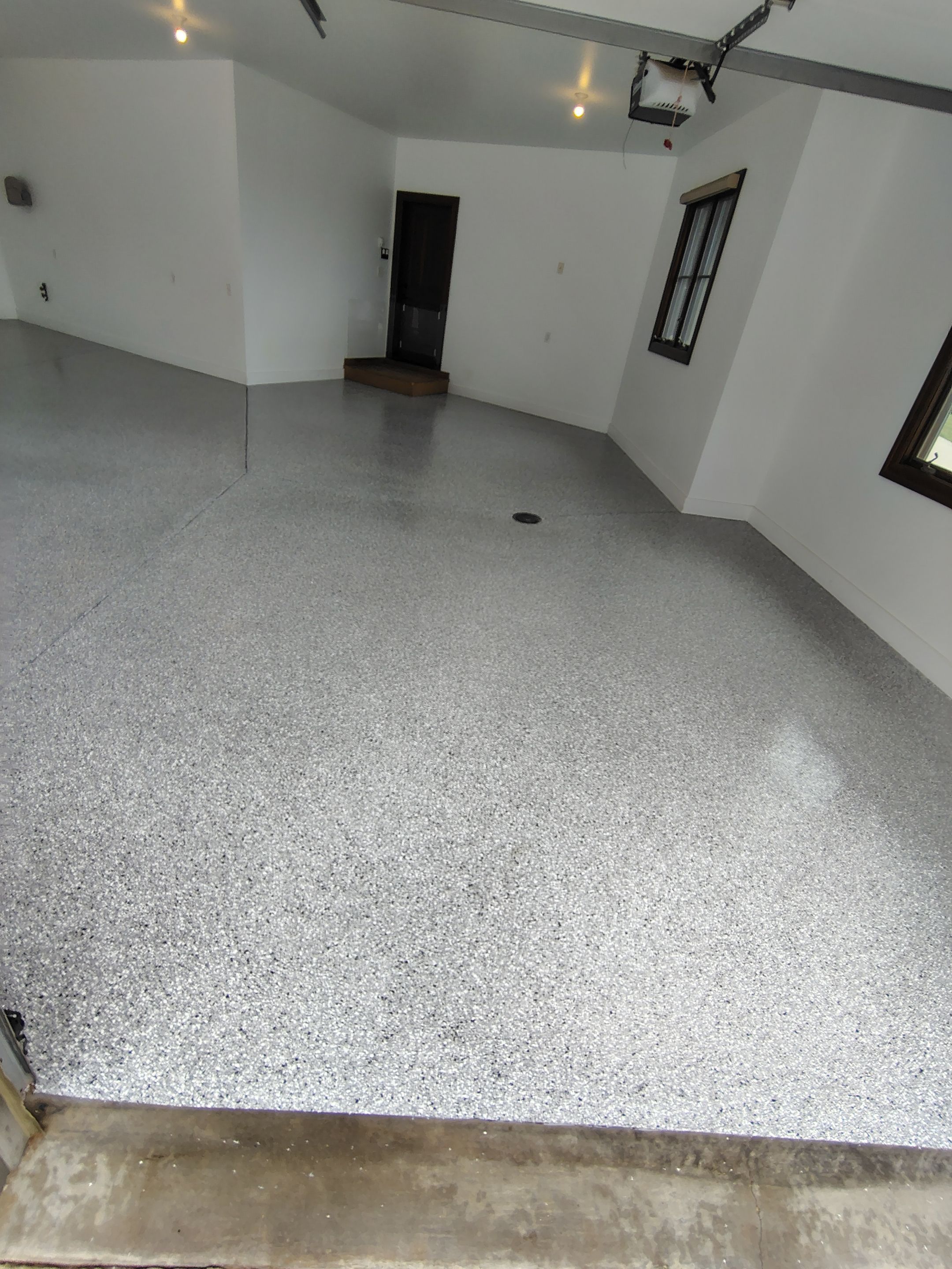Feather Grey Floor Coating in Sioux Falls, SD by Select Painting, Coatings & Garage Cabinets