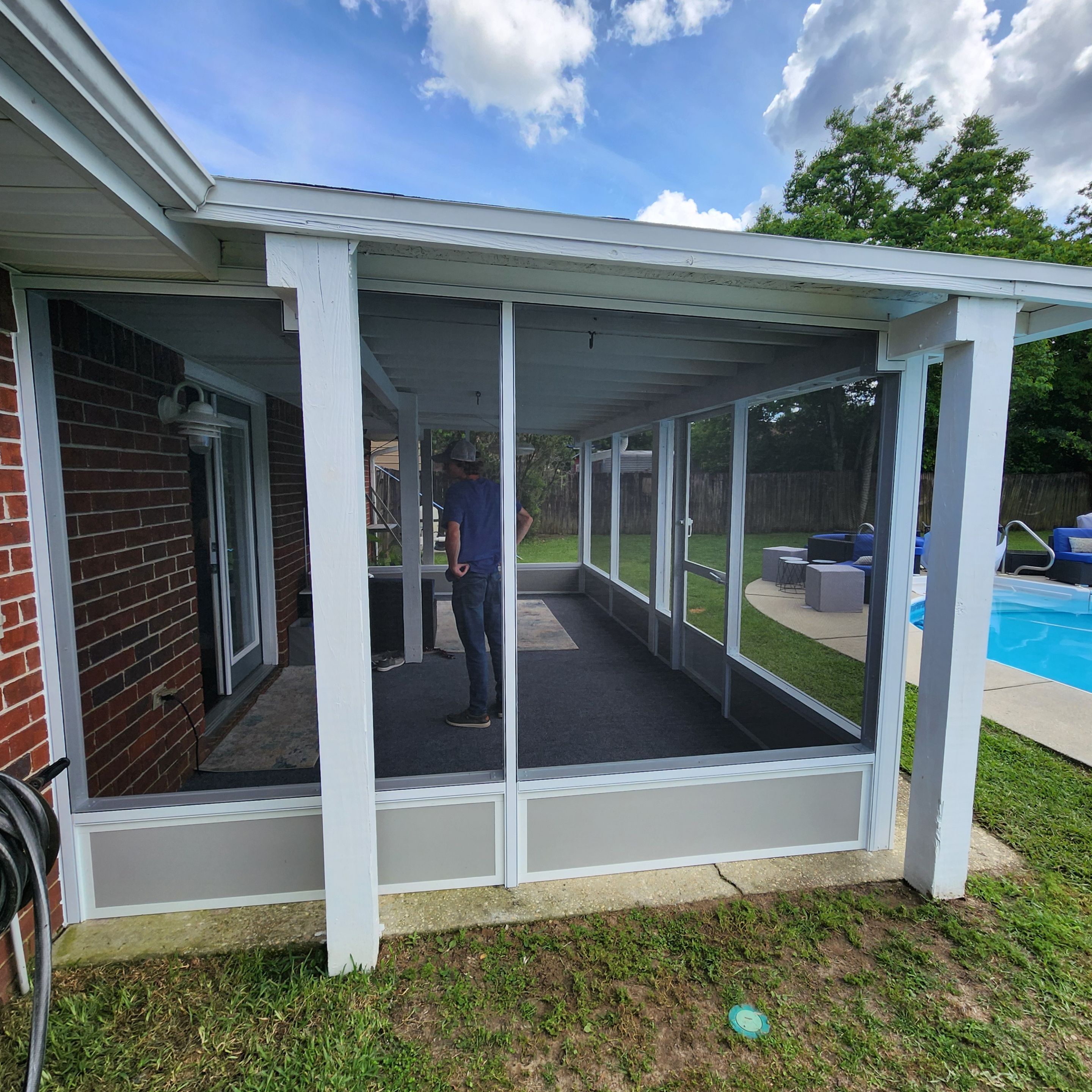 Screen Room Built Under Existing Roof by Titan Sunrooms