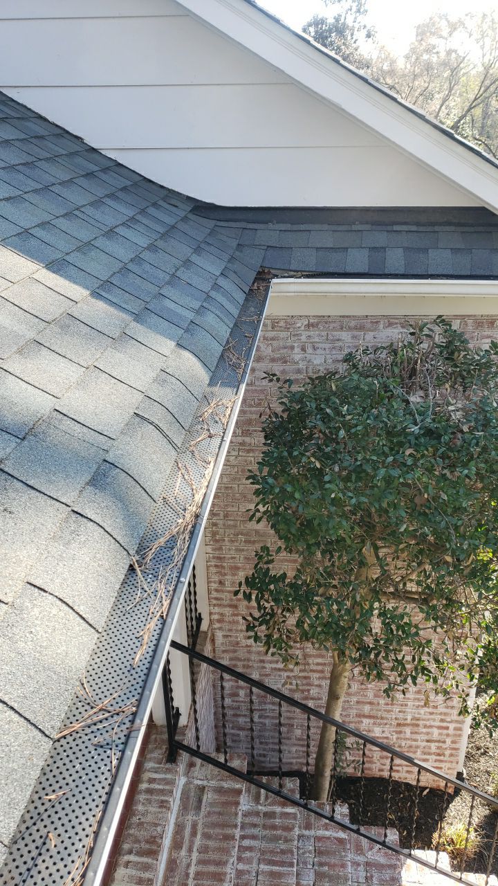 Gutter Cleaning using water by Power Wash Masters LLC