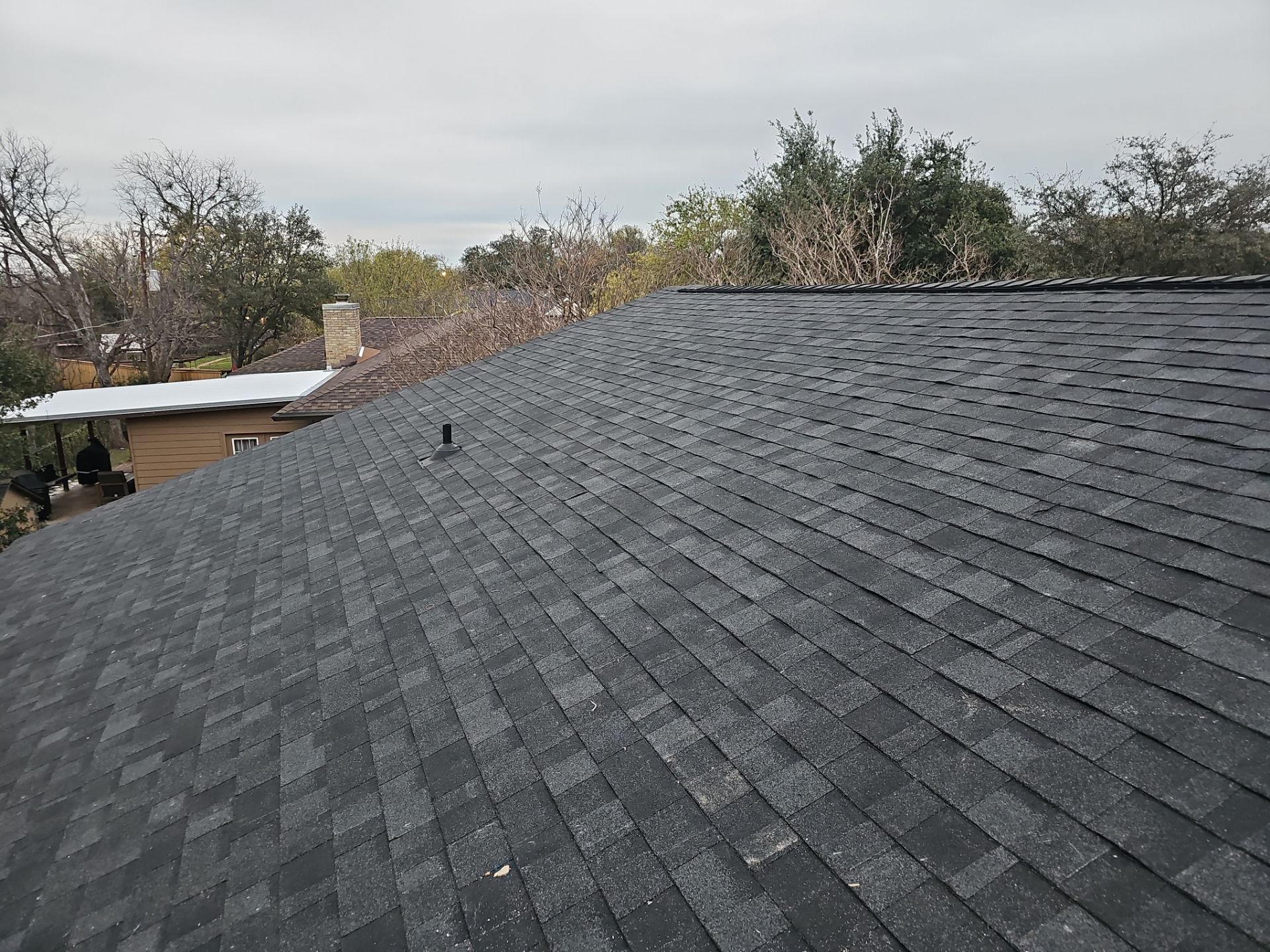 Residential Roofing Installation using IKO Dynasty Shadow Brown by DeZign Roofing & Exteriors