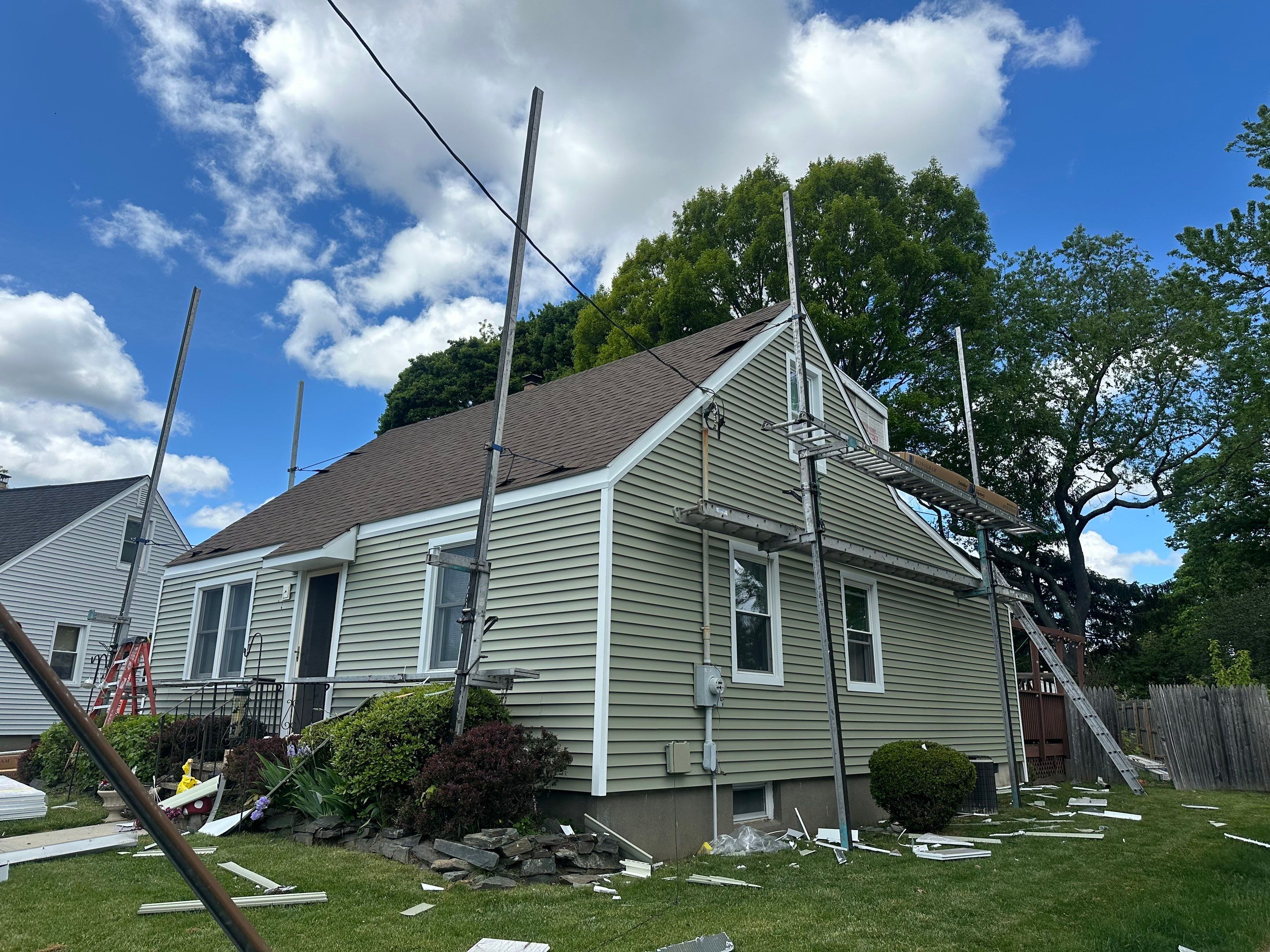 New Vinyl Siding Installation for Milford Home and Detached Garage by A Plus Exterior