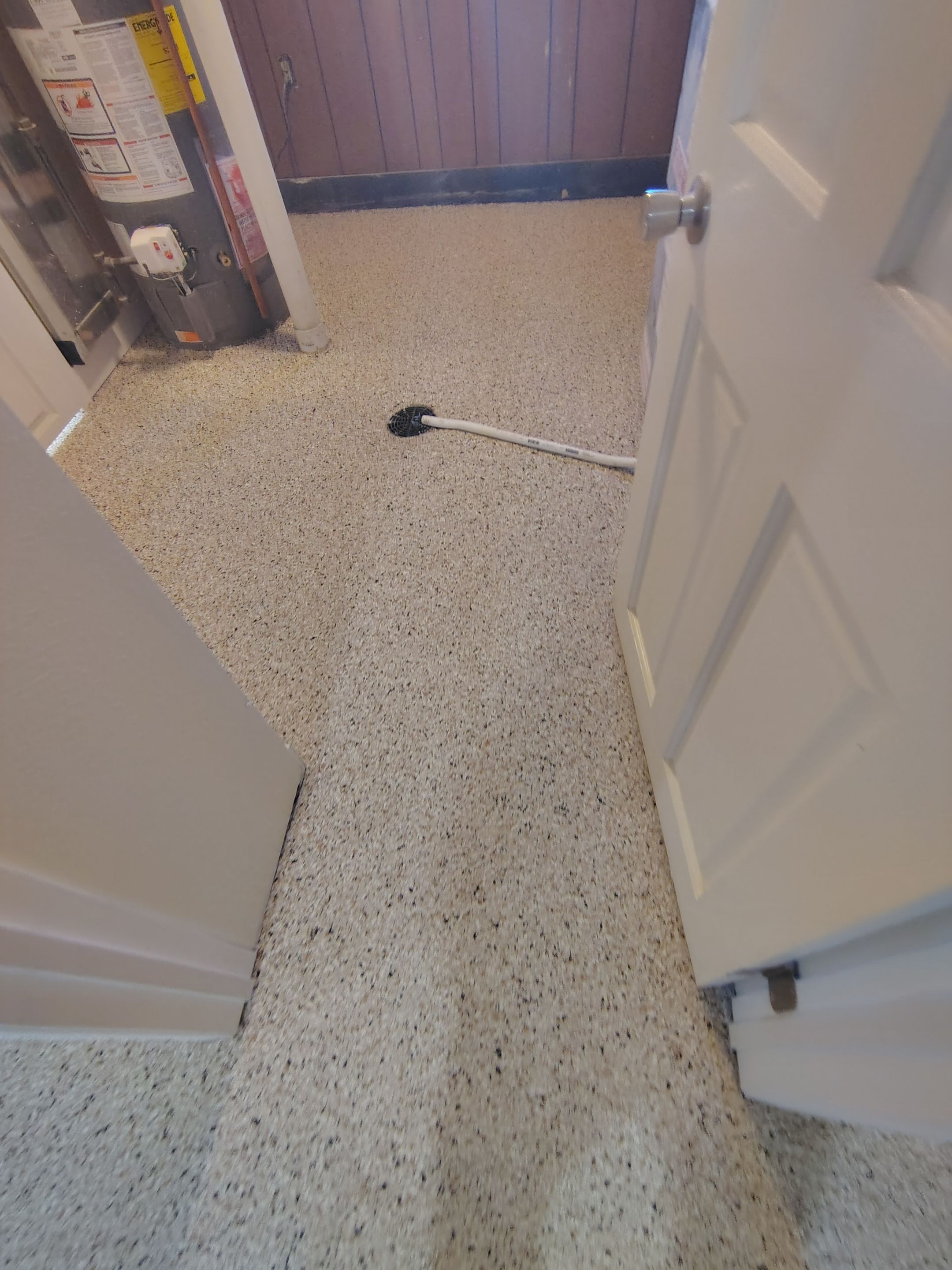 Comprehensive Basement Concrete Floor Coating and Crack Repair in Sioux Falls by Select Painting, Coatings & Garage Cabinets