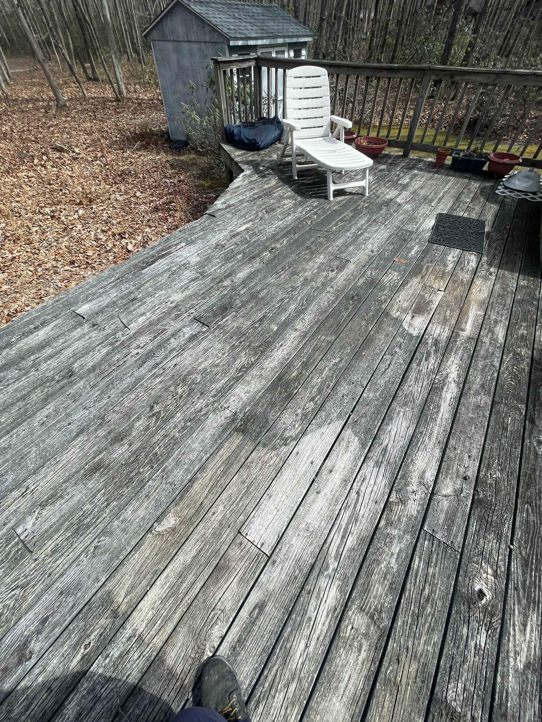 Pressure treated wood deck cleaned by SJ Exterior