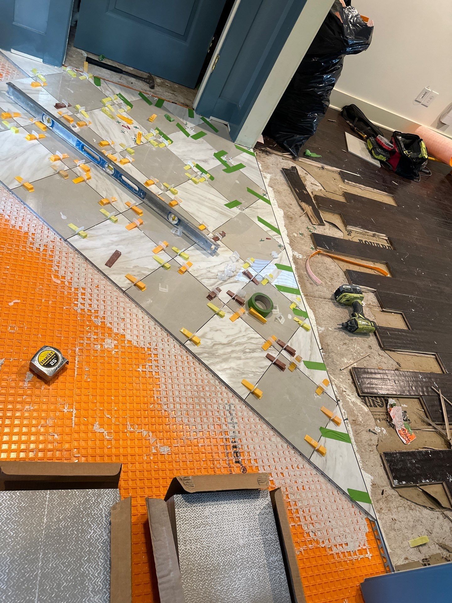 White Oak Hardwood and Checkerboard Tile Installation by Footprints Floors of Nashville