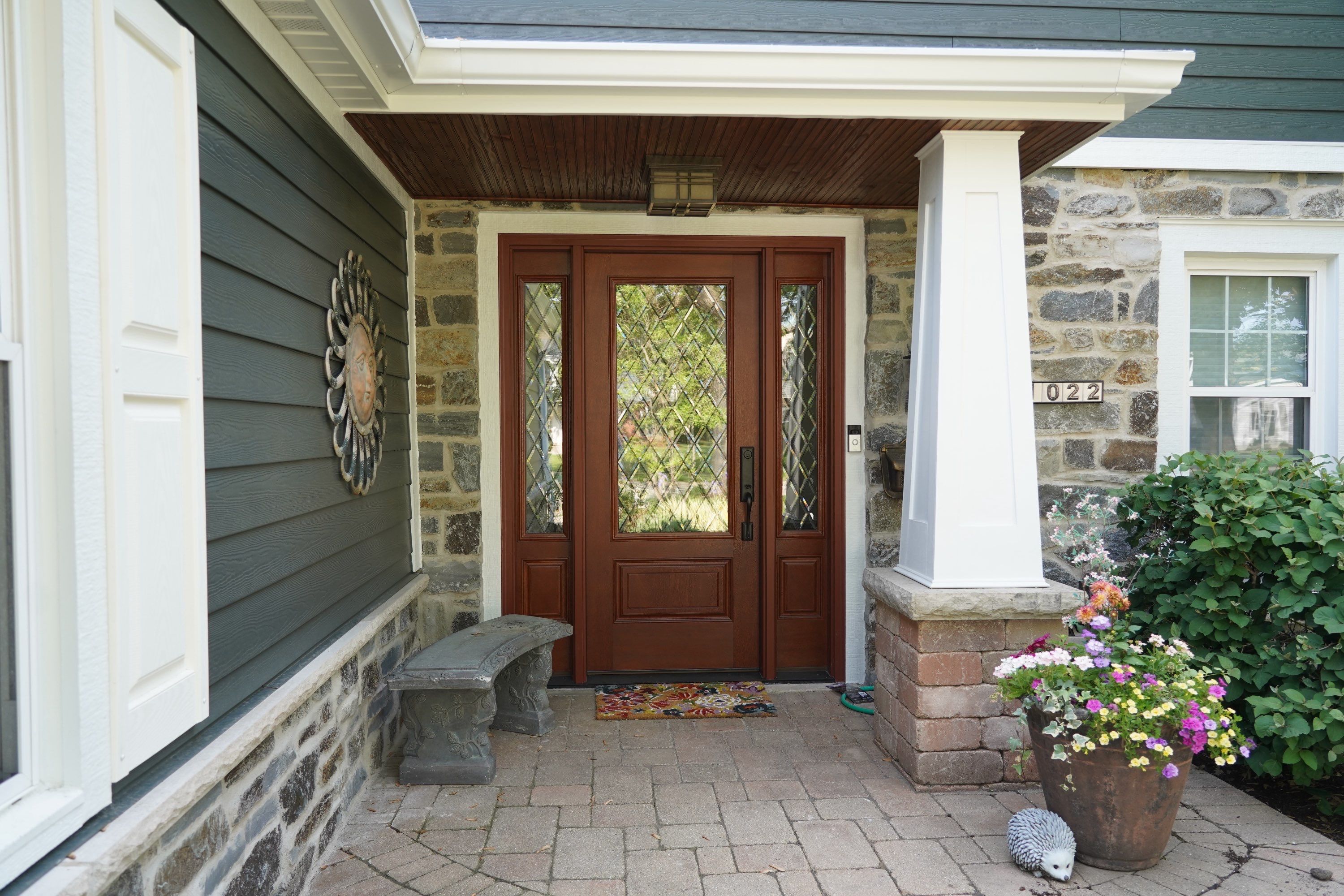 Exterior Renovation with James Hardie Siding and Natural Stone in Lombard by Great American Exteriors