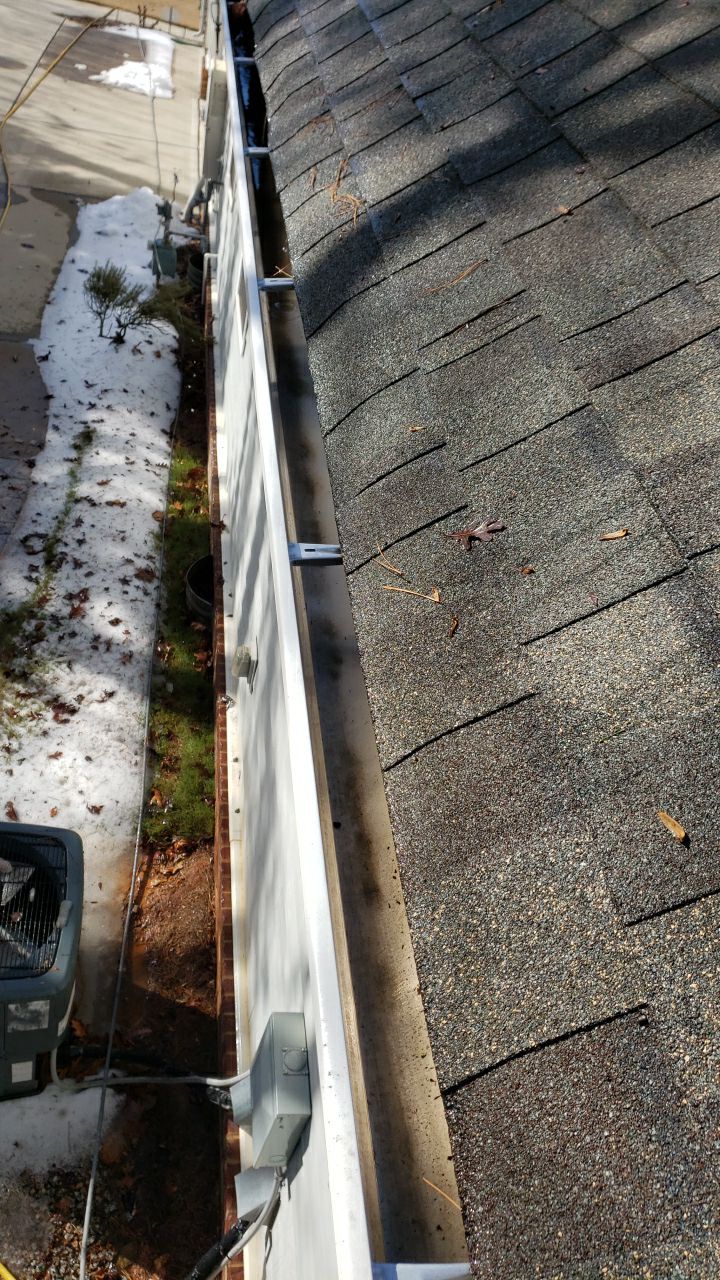 Gutter Cleaning using water by Power Wash Masters LLC