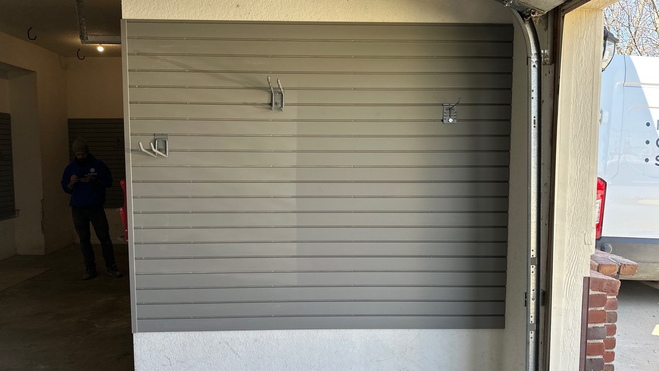 Melissa L. upgraded her garage with slatwall and overhead racks by Banner Garage
