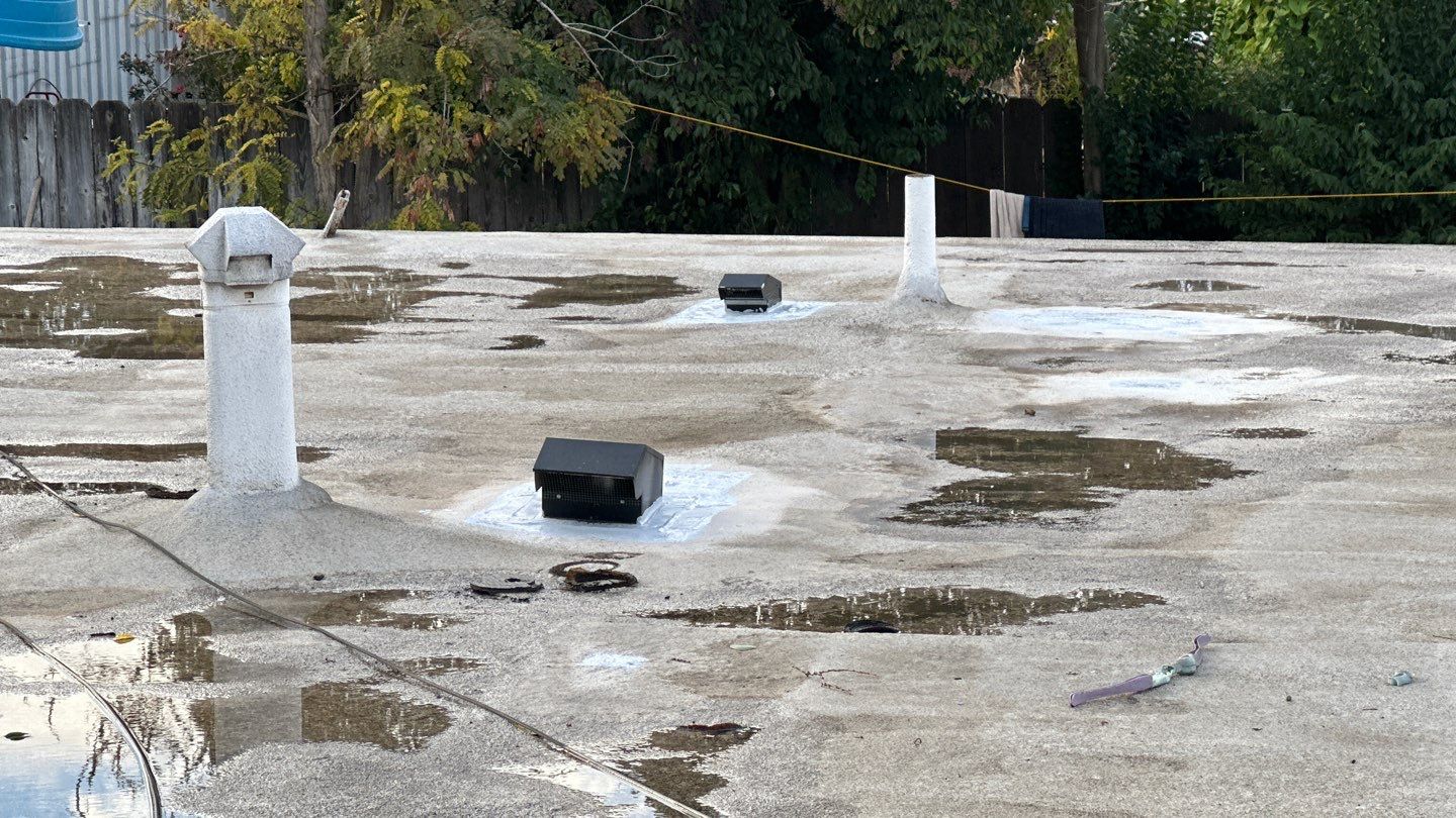 Foam Refurbish using Conklin Benchmark/PUMA XL coatings and spray foam by Straight Edge Roofing Inc