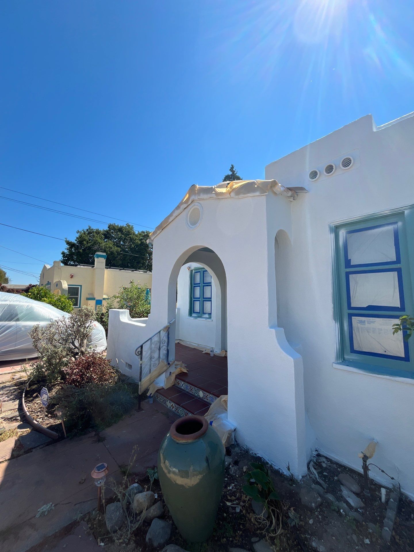Exterior Transformation with Fresh Stucco and elastomeric system for waterproofing by Herrera’s Bay Area Painting inc.