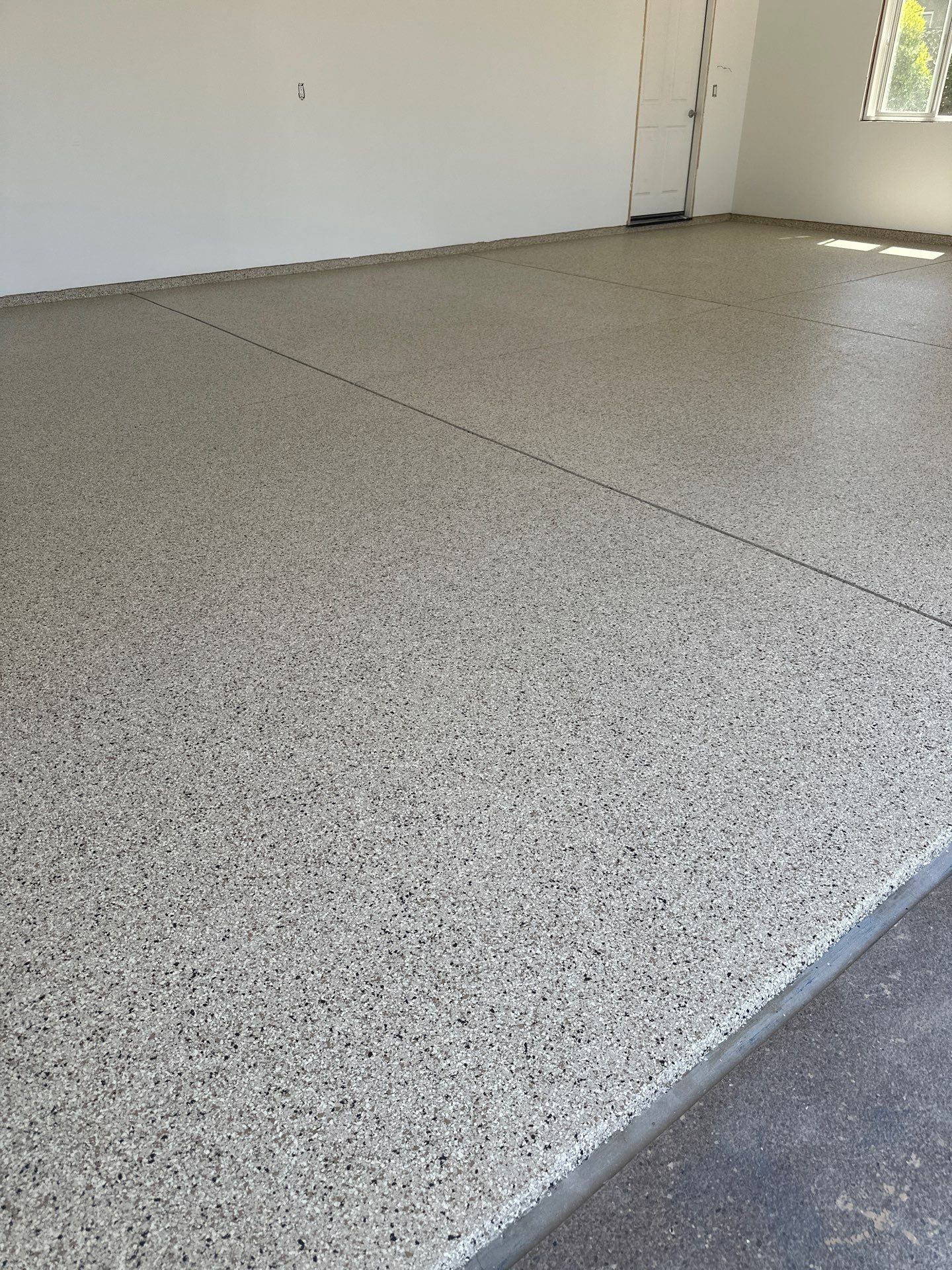 San Luis Obispo Garage Floor Polyurea Coating with Driftwood Flakes by MGP Coatings