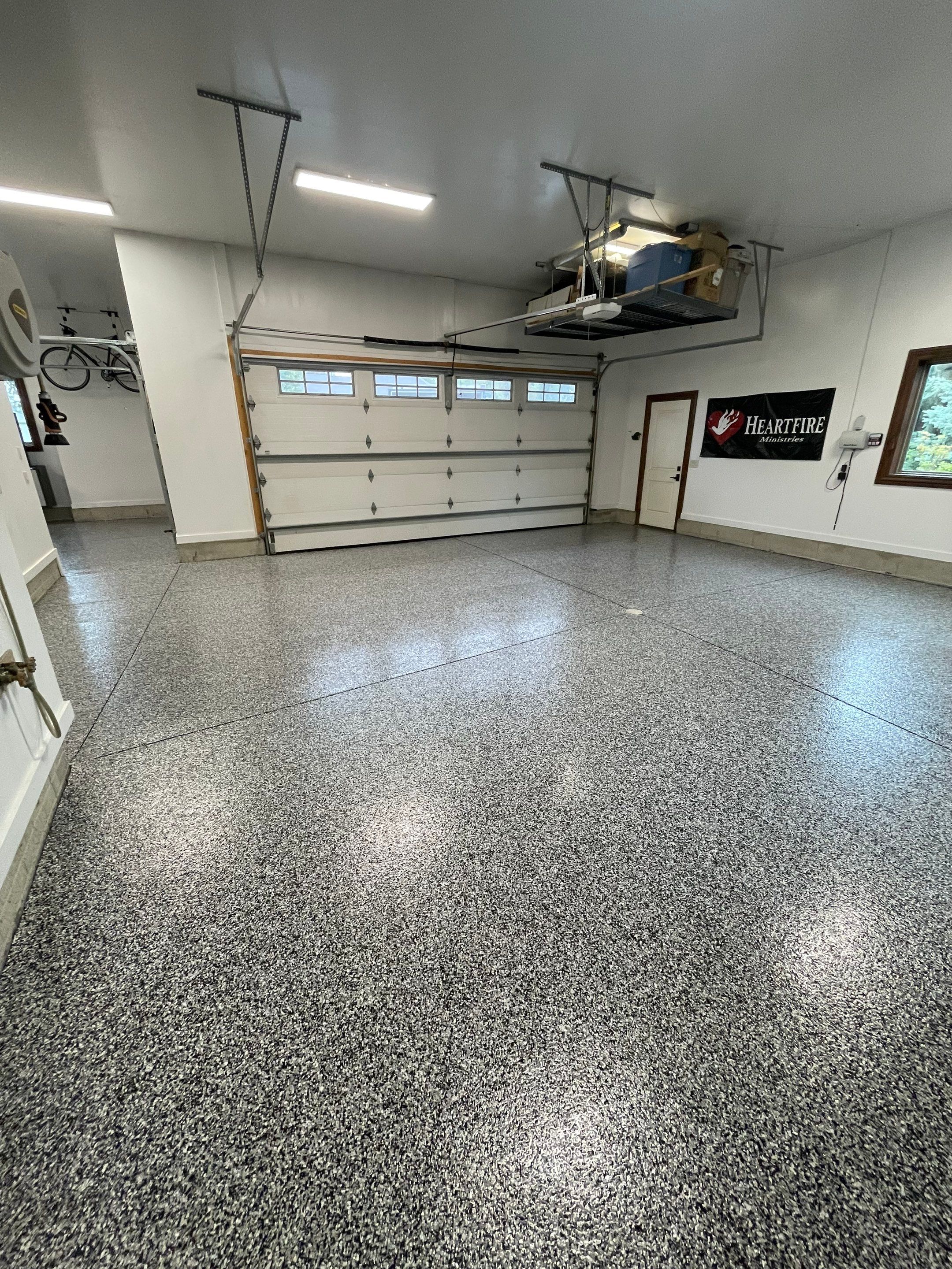 Garage Floor Coating and Domino Flake Finish in Sioux Falls by Select Painting, Coatings & Garage Cabinets