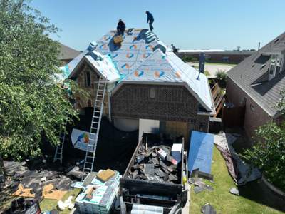 Residential Roofing Installation using Malarkey Highlander Weathered Wood Plus