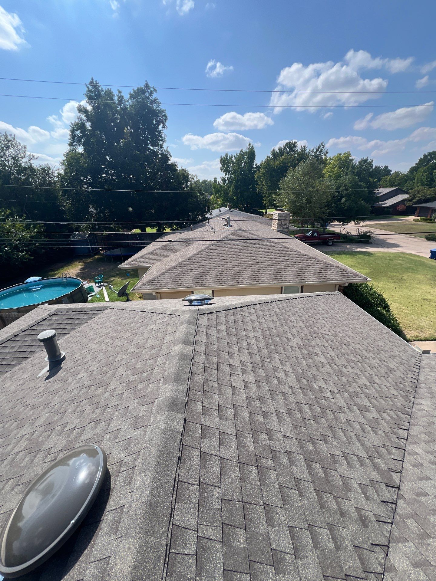 Roof Replacement and Gutter Installment in Enid, OK by McCann's Roofing and Construction