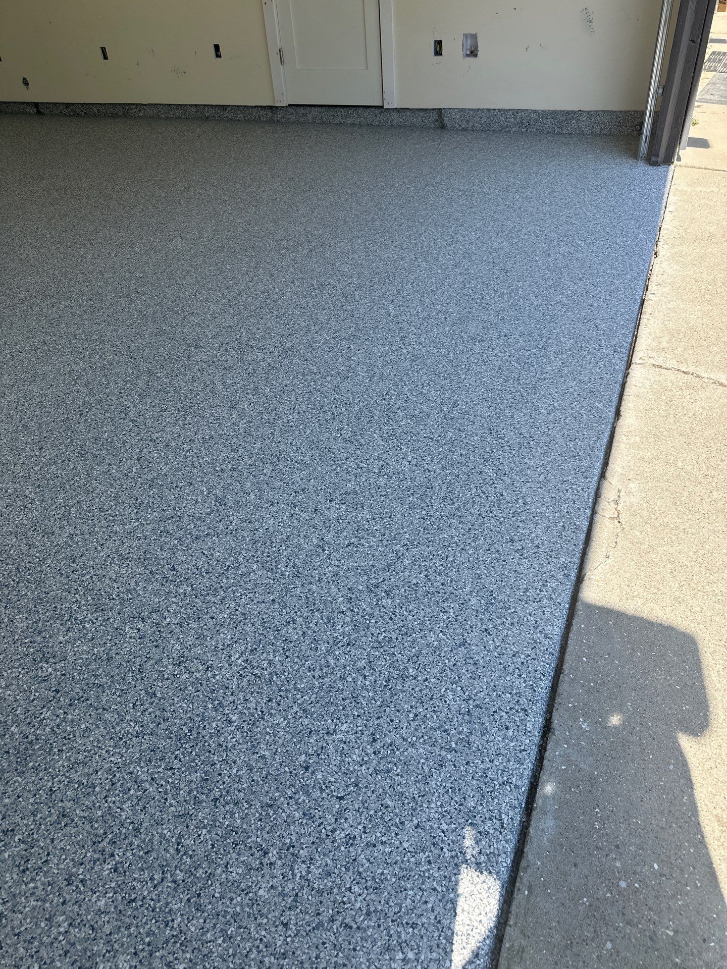 Polyurea Garage Floor Coating with Tidal Wave Flake Finish by MGP Coatings