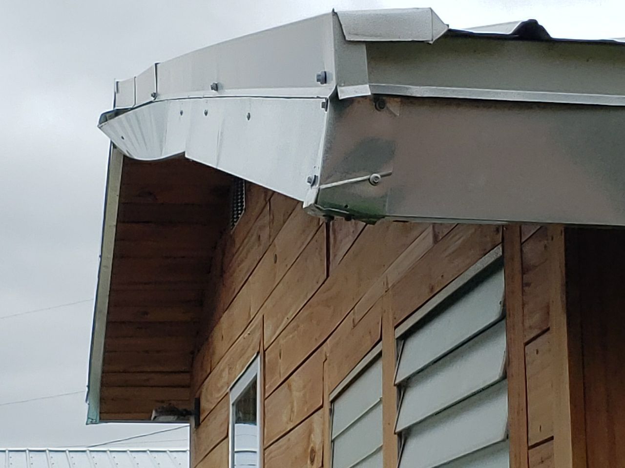 Gutter Installation using K-Style Seamless Gutters and Soffit and Fascia Replacement by Gutter Professors