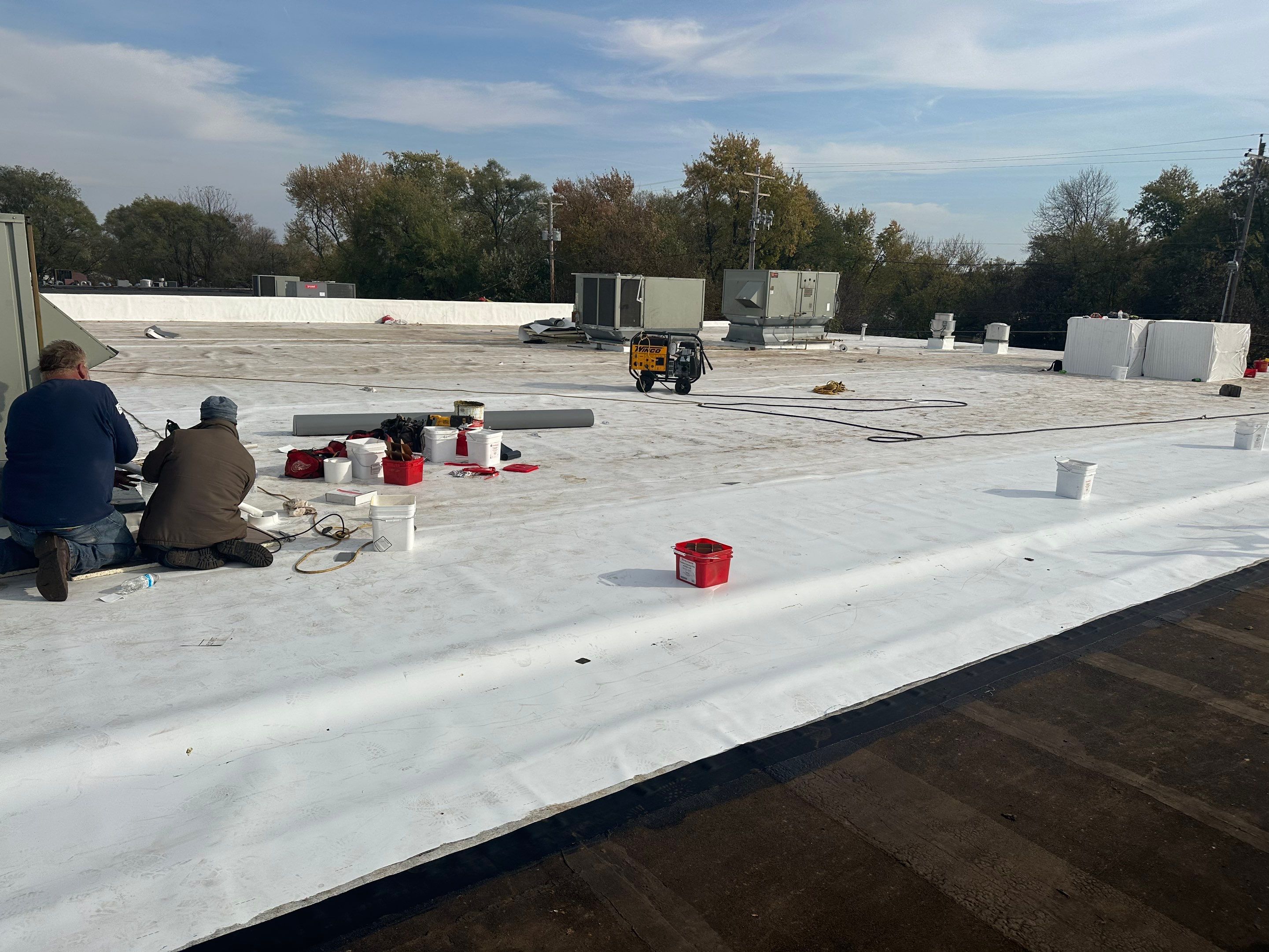 Commercial Flat Roof Replacement by Assured Restoration