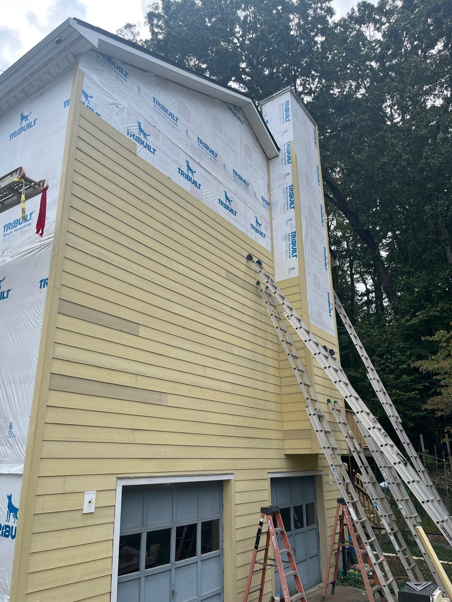 James Hardie Siding Replacement and Pressure Treated Pine Deck Resurface  by Nelson Exteriors 