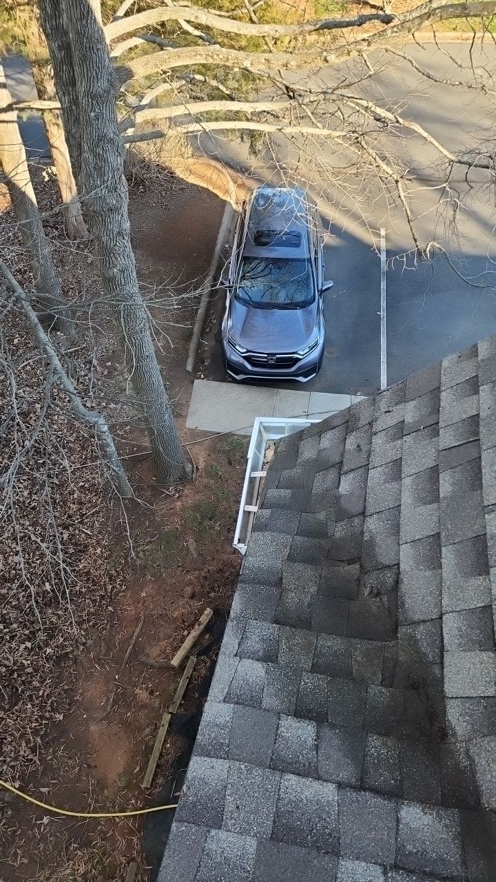 Gutter Cleaning using water by Power Wash Masters LLC