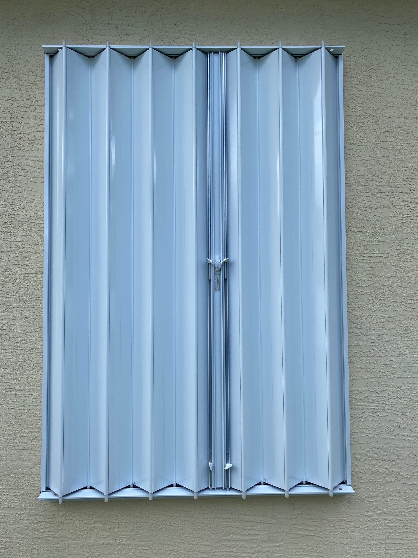 Accordions in White by Smart Guard Shutters