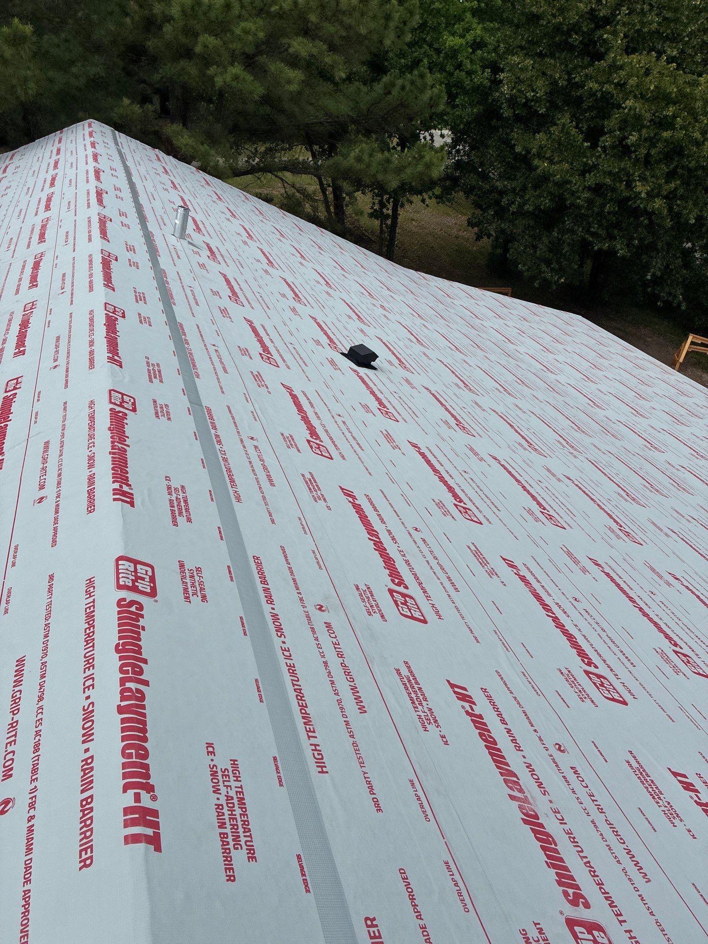 Copper Metallic 26-gauge low rib metal roofing. by In & Out Construction & Remodeling, LLC