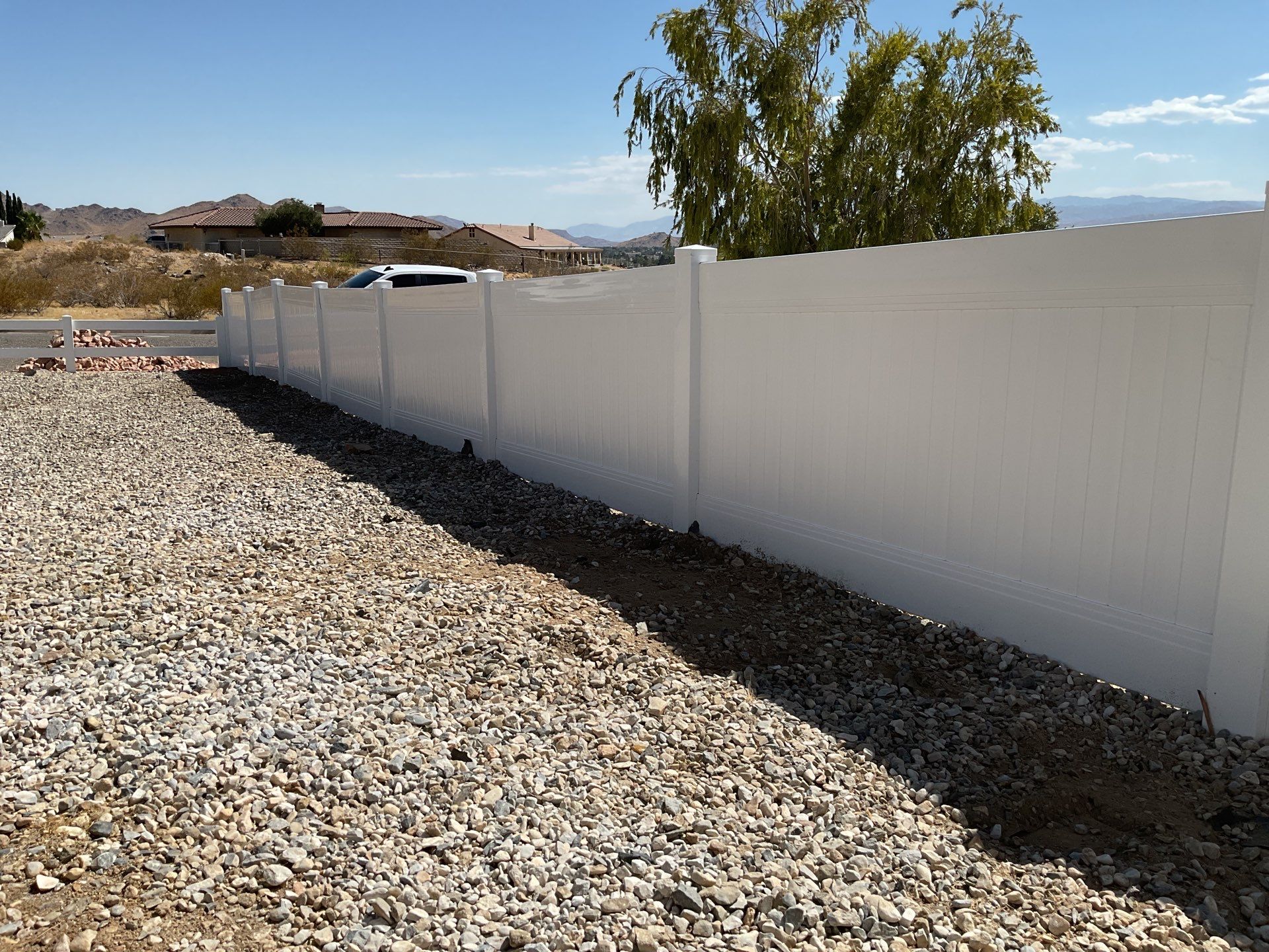 4' and 6' Privacy Vinyl with 2-Rail Ranch Style Vinyl Fence by Fence Guys Inc.