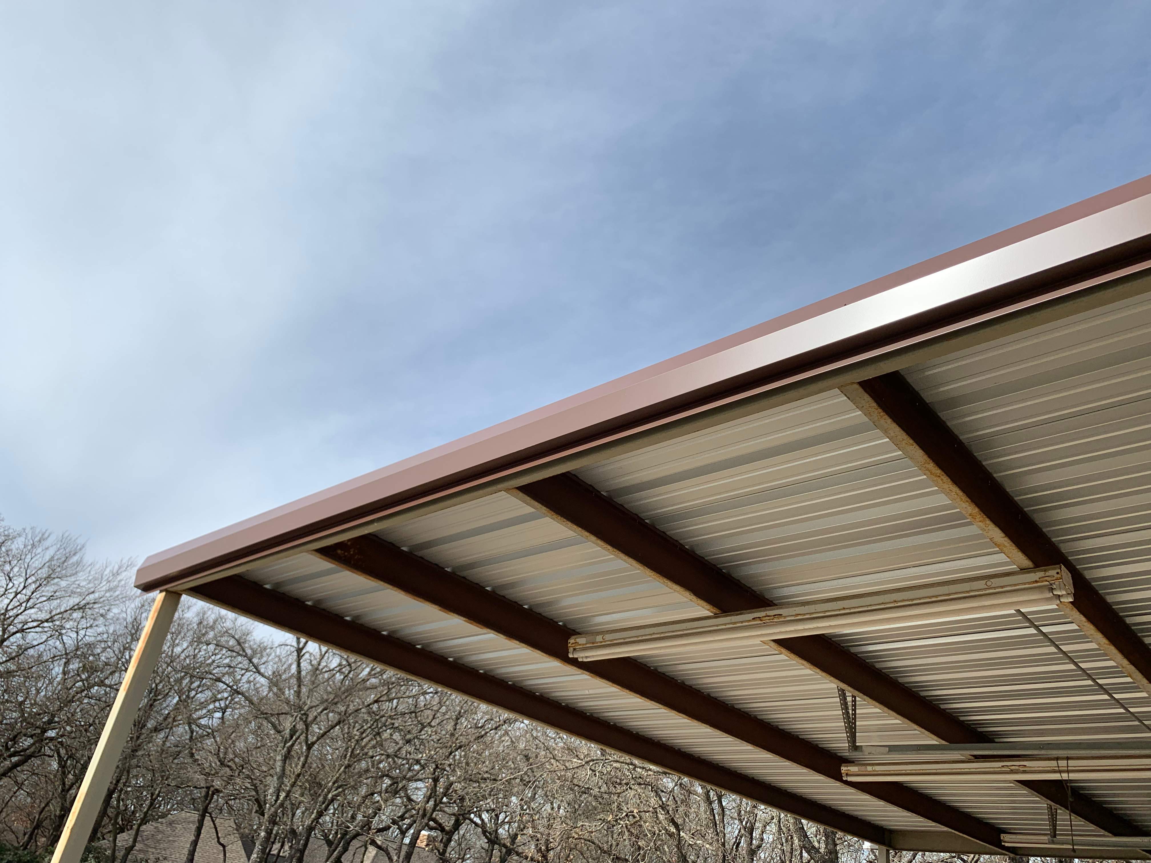Install new R Panel Metal Roof at a Clients Farm house by First United Roofing & Construction
