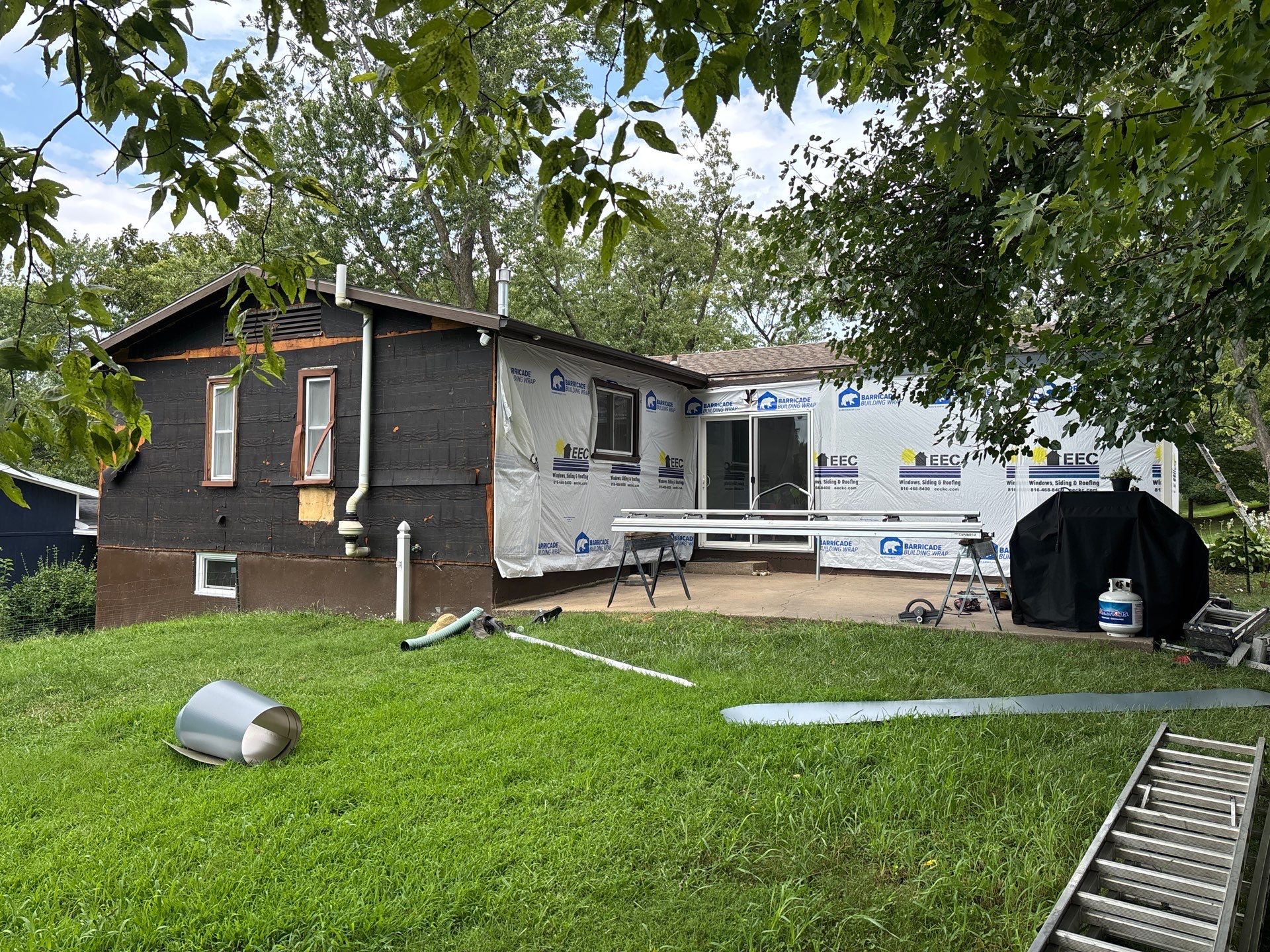 Complete Exterior Transformation With Craneboard Siding and Heartland Windows by EEC Windows, Siding & Roofing