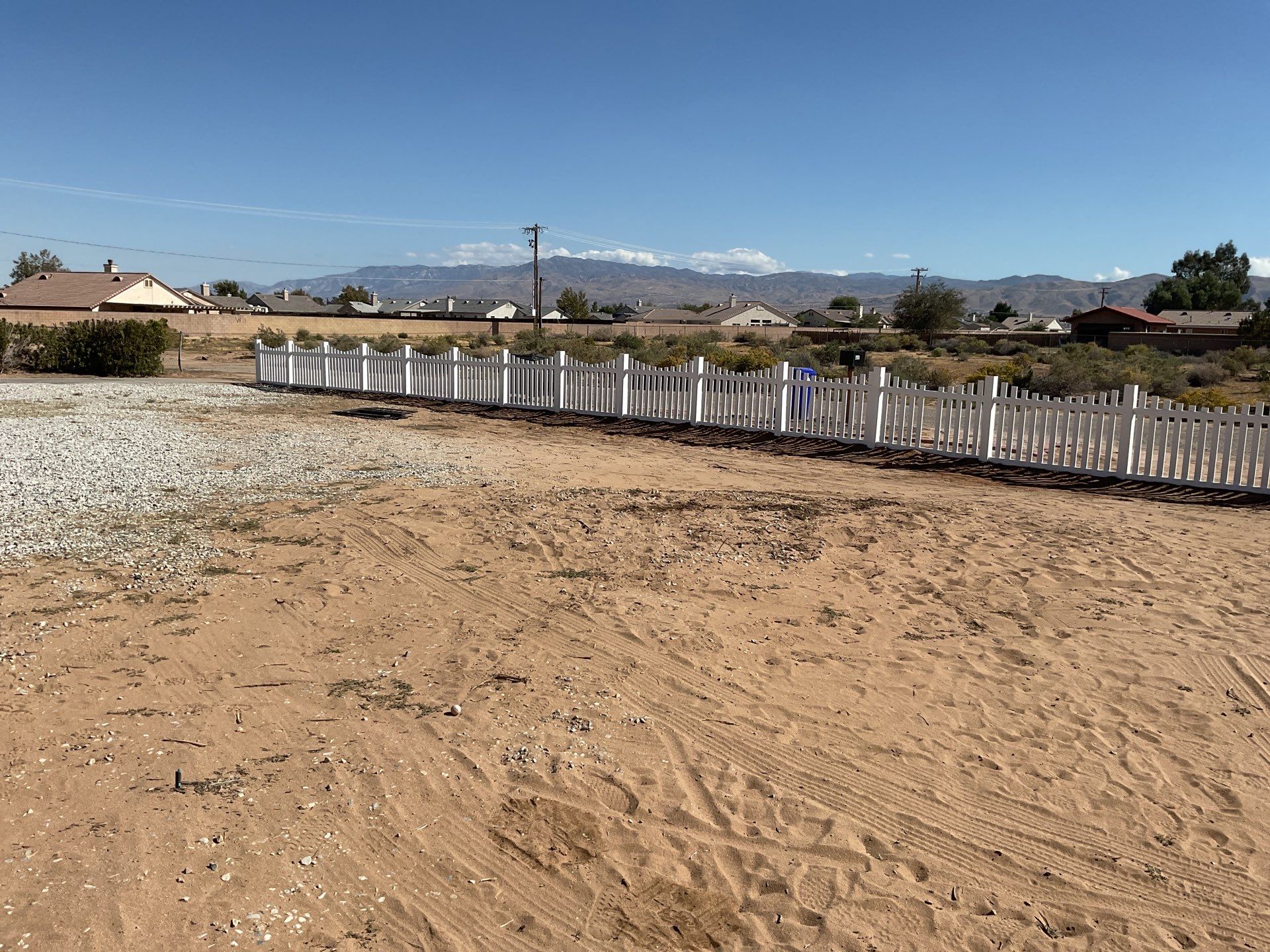 White picket fence  by Fence Guys Inc. 