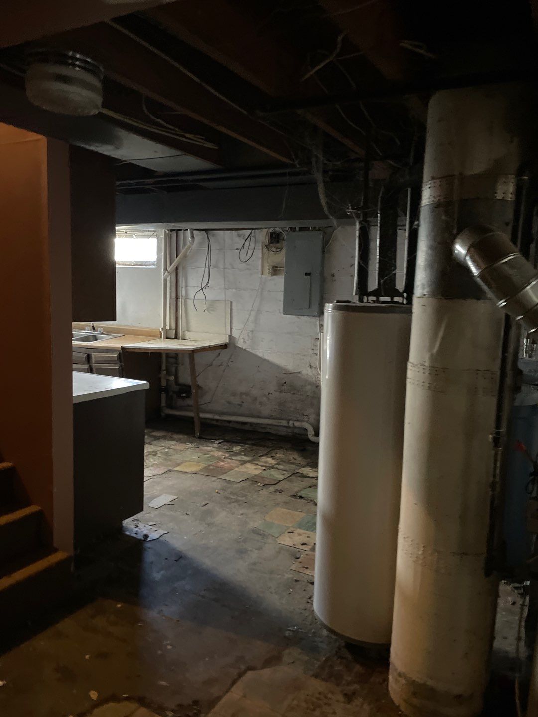 Interior drain tile system installation by ACE Waterproofing & Basement Solutions