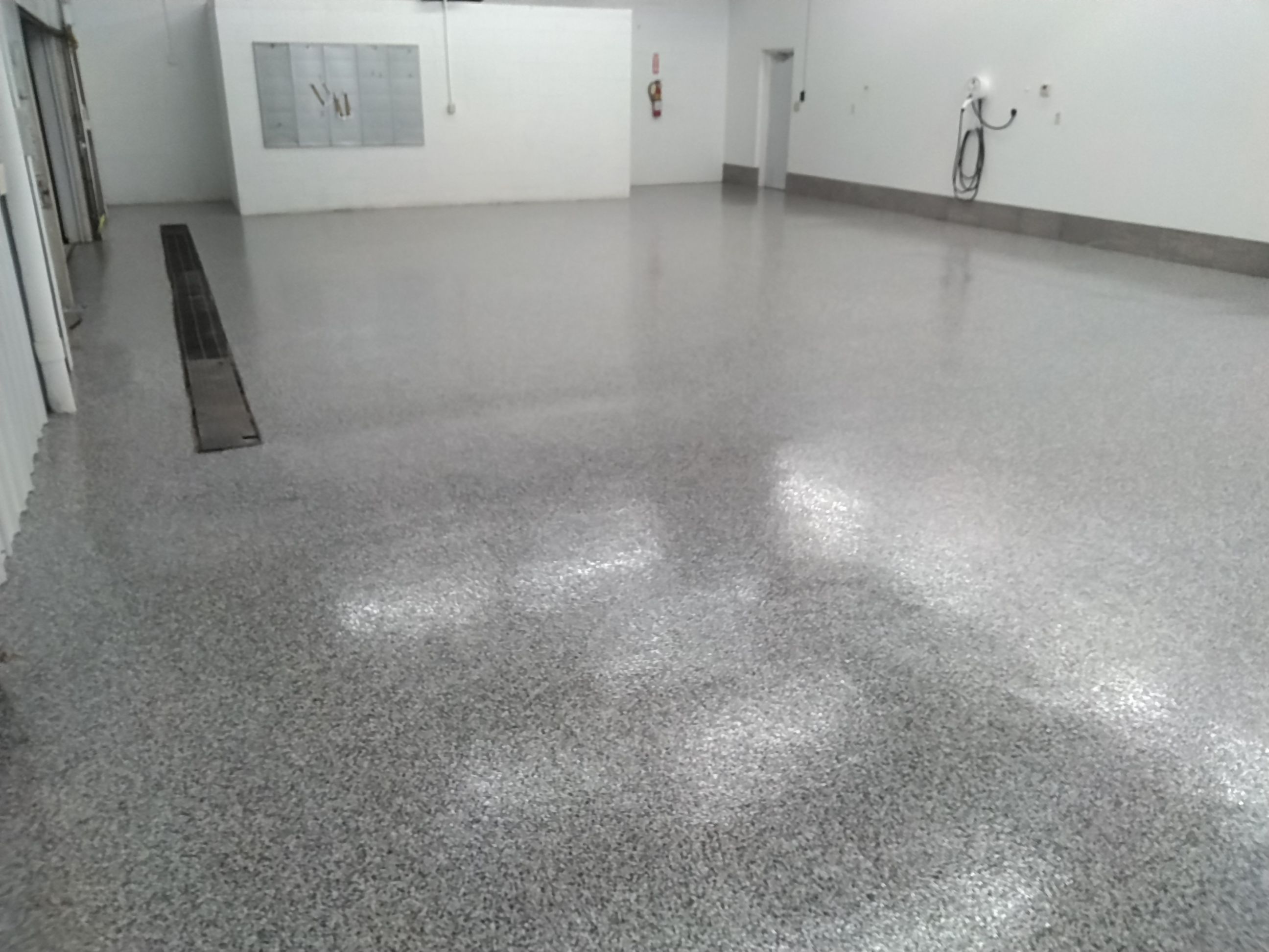 Commerical  using Domino by Fantastic Floors by Miller Custom Exteriors 