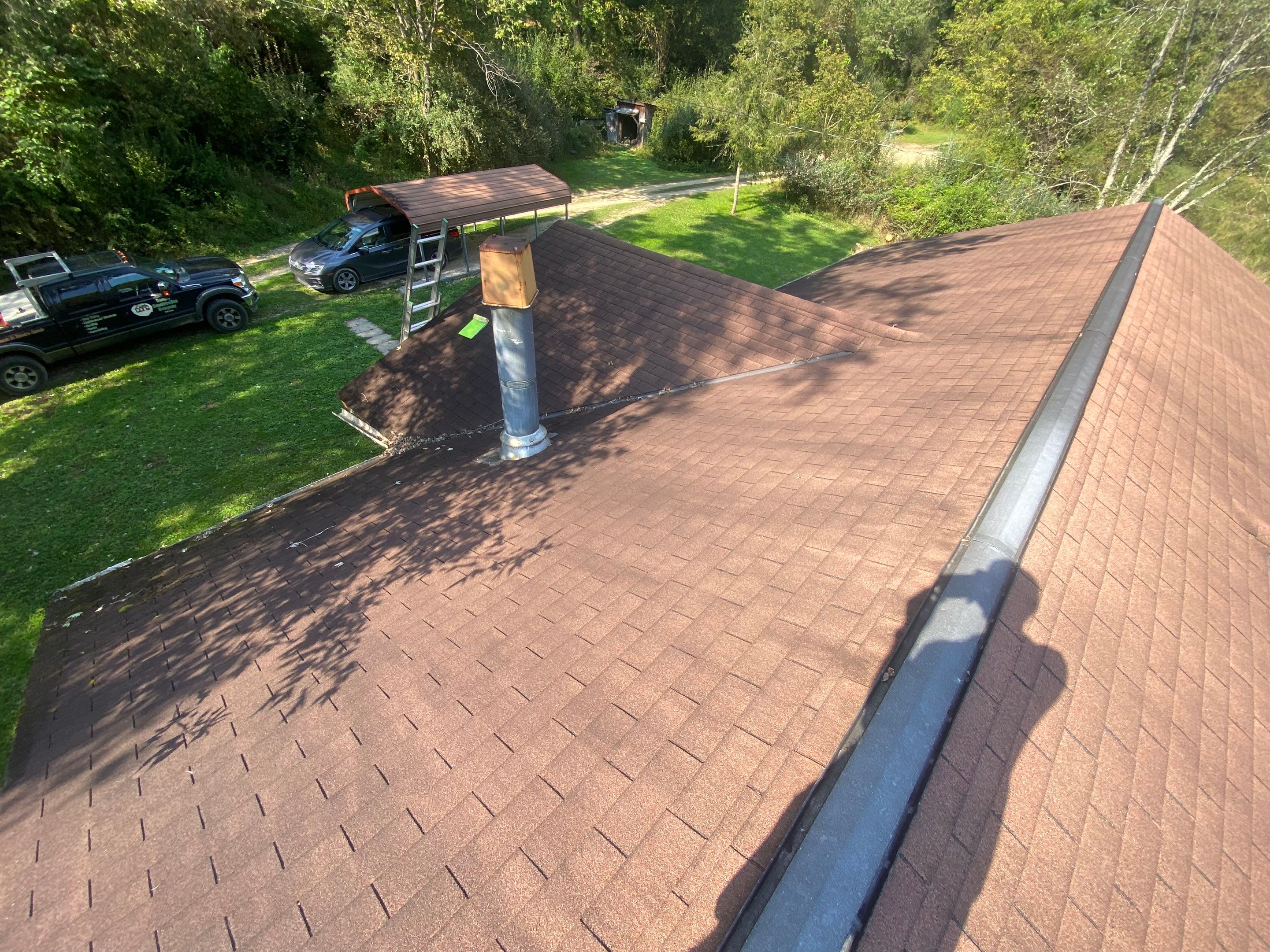 Metal Roof and Vinyl Siding, Soffit, Gutters using LifeTite Premium metal roofing  by Secure Construction Company Inc