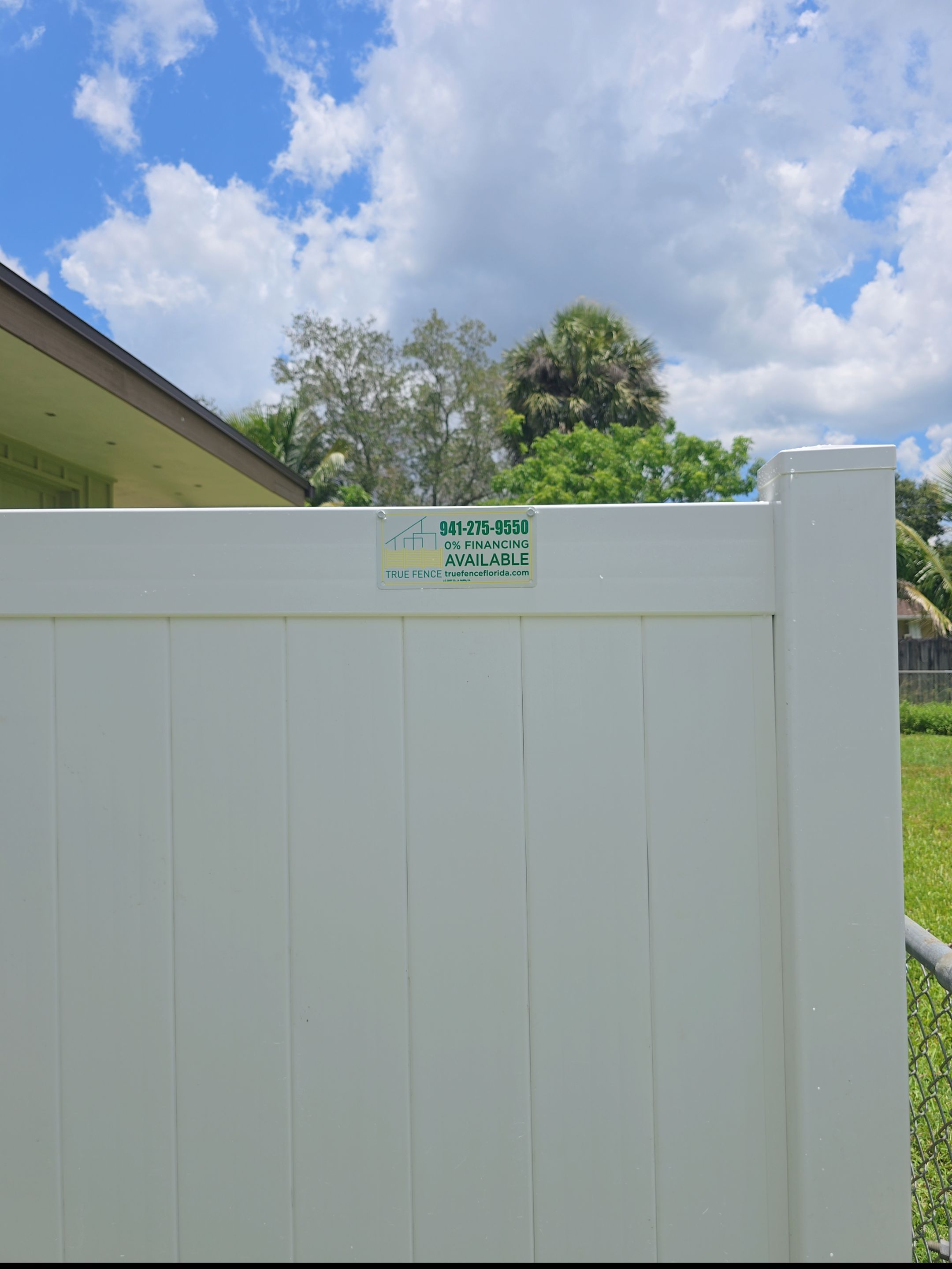 Residential Chain Link Fence Repair and Vinyl Privacy Gate Installation in Naples by True Fence LLC