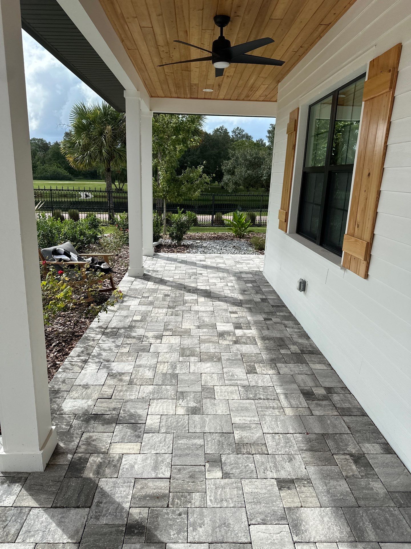 Complete Two-Story House Wash and Driveway Cleaning in Winding River Community, Bradenton, FL by Sunshine AquaWash