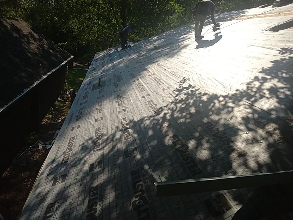 Residential Roofing Installation using Roof Replacement by American Roofing & Construction LLC