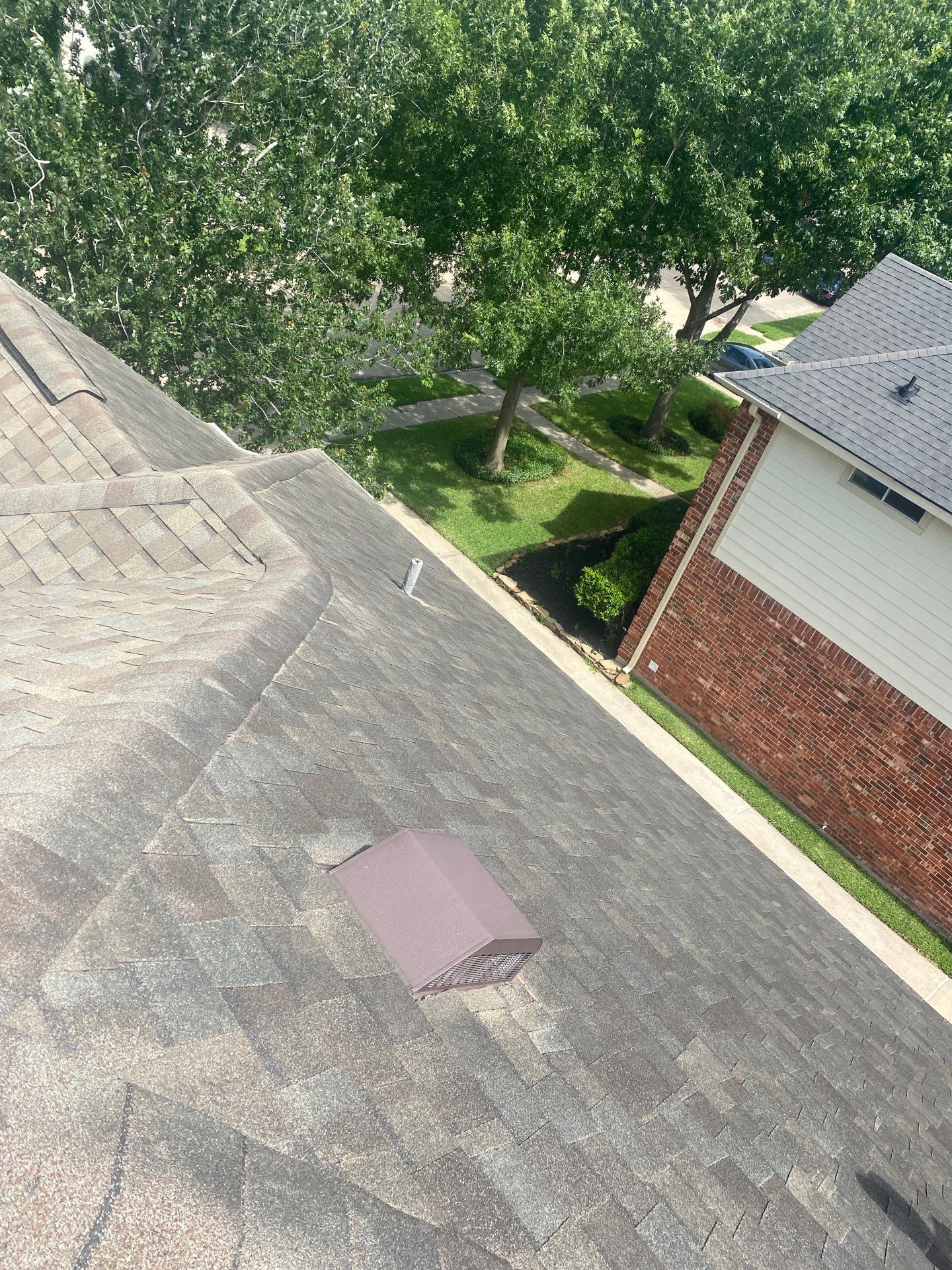 Hail Damage using Owen's Corning Duration (Lifetime) Shingles by Roof Repair Company