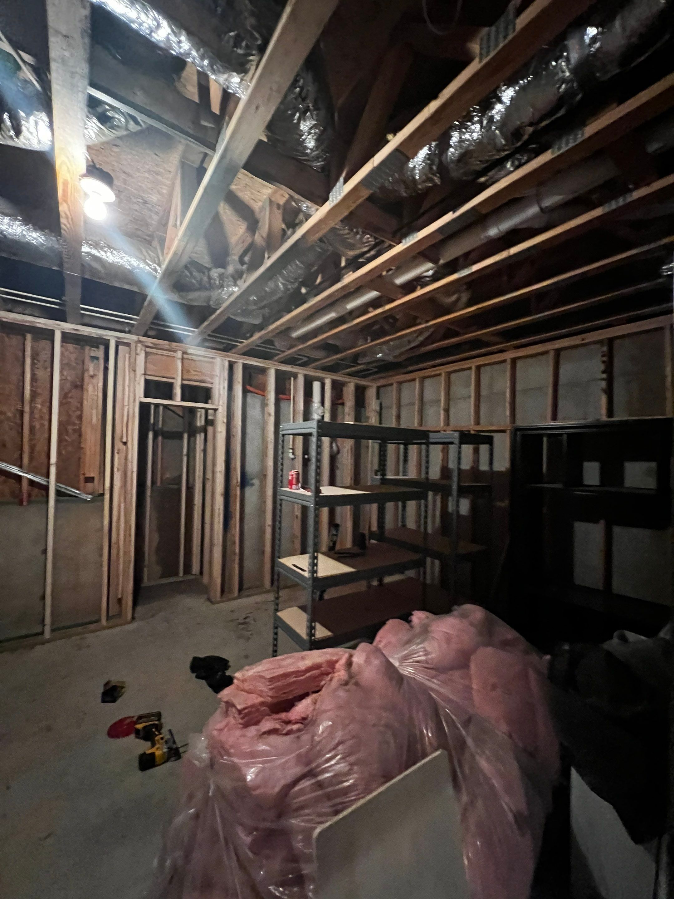 Basement Remodeling With New Bathroom and Luxury Vinyl Flooring by Swift Home Renovations