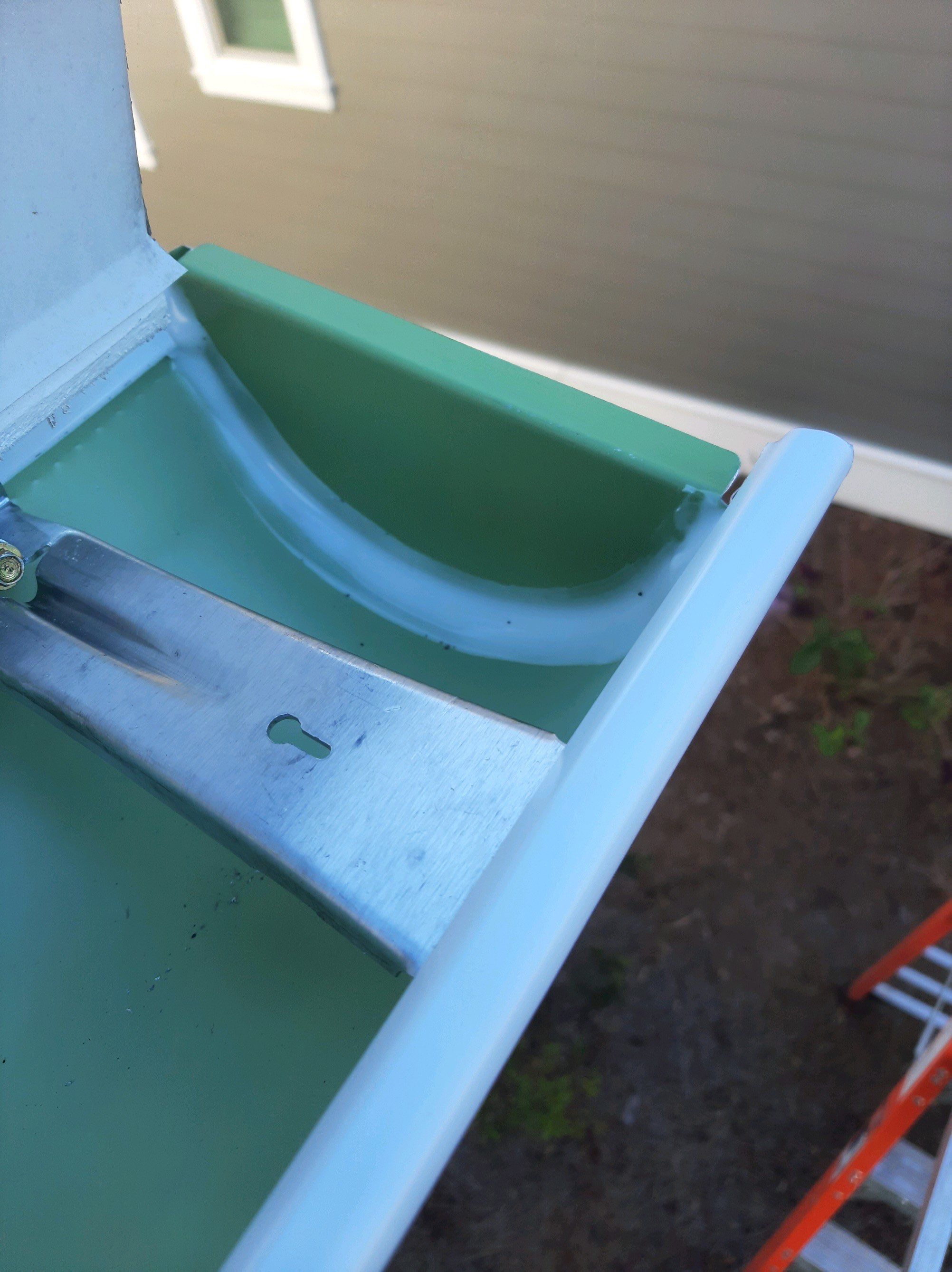 Gutter Installation Using Half Round Seamless Gutters by Gutter Professors